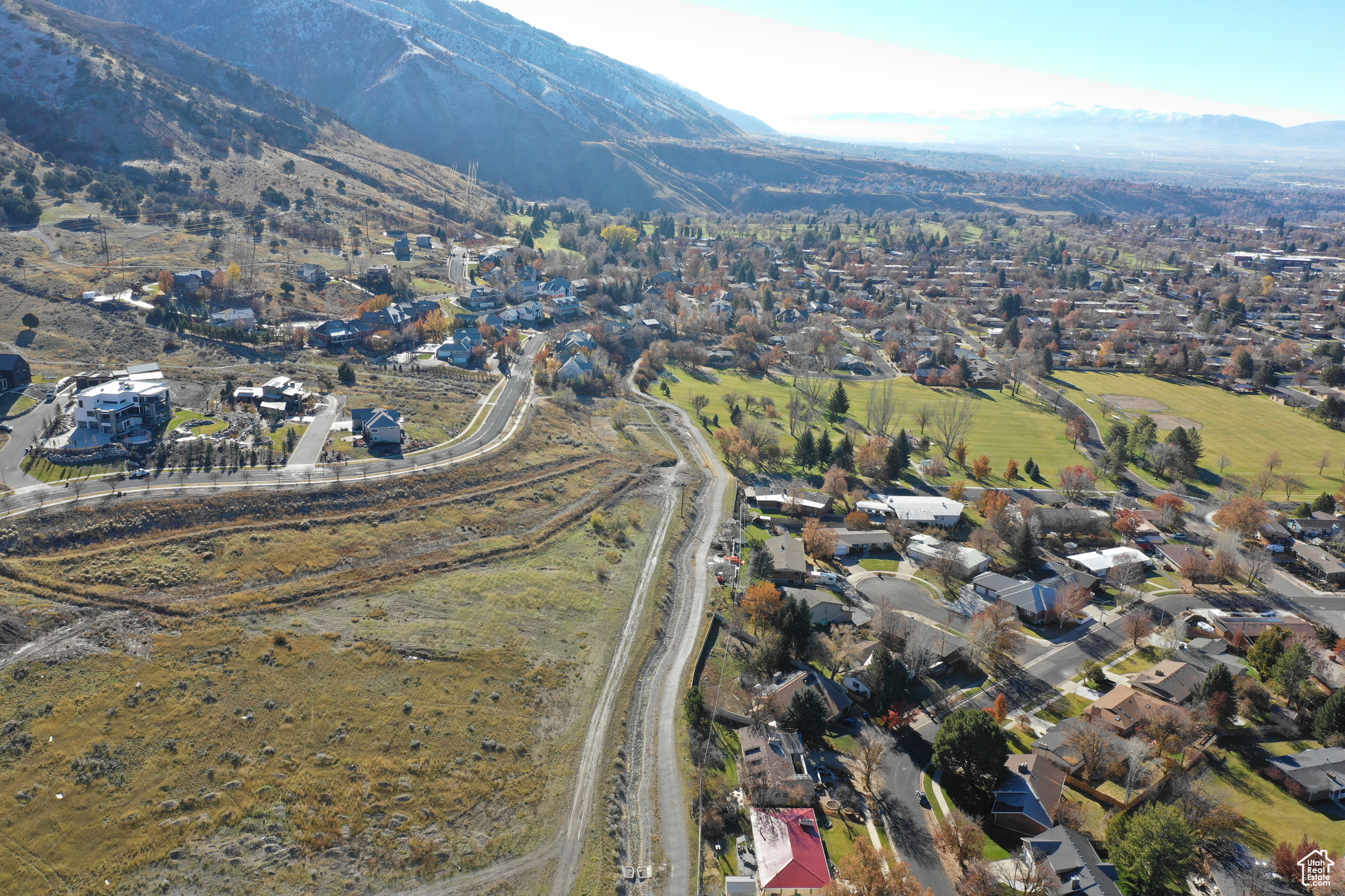 Birds eye view of property with a mountain view