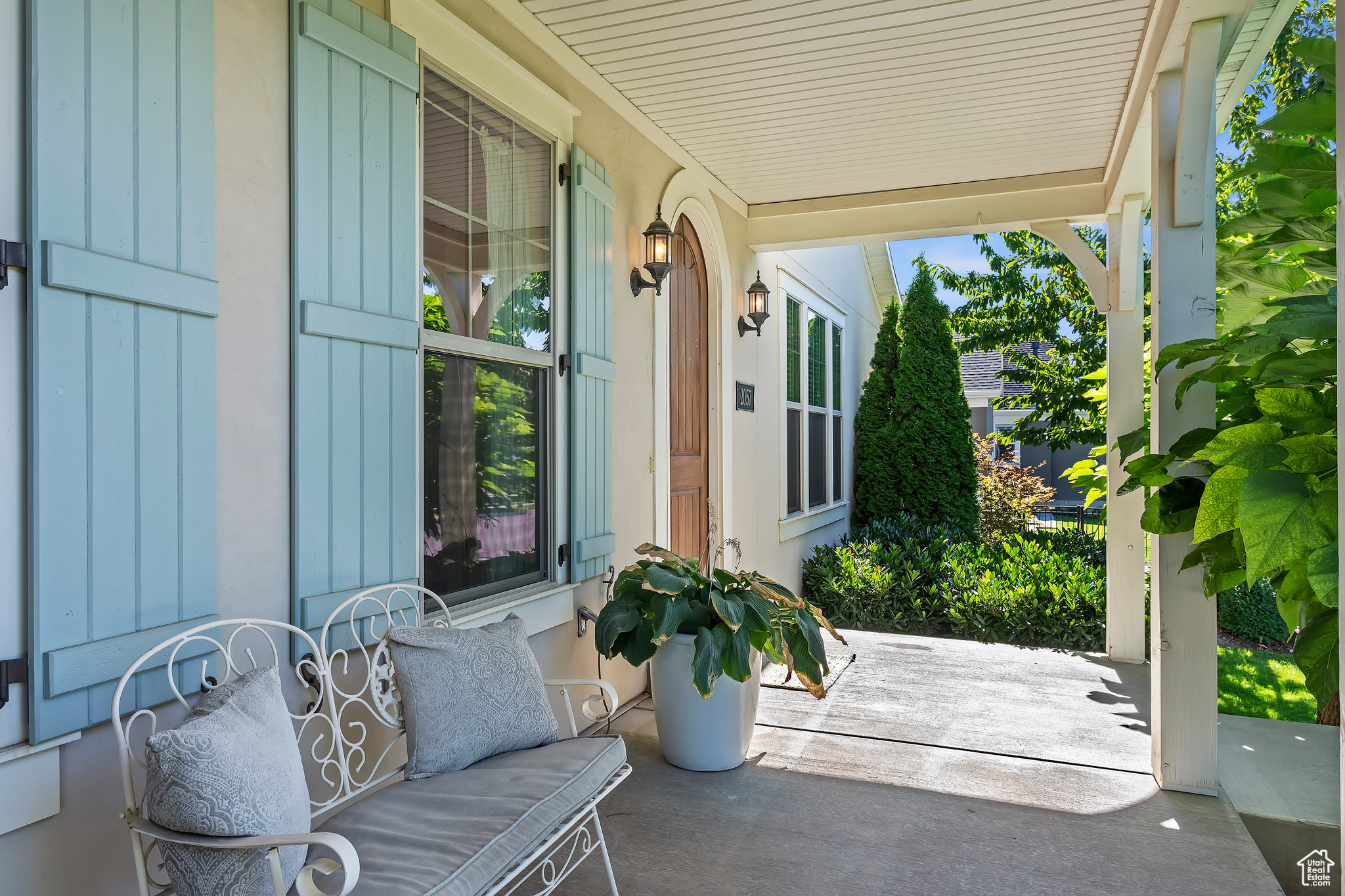 Summer Time - View of patio featuring a porch