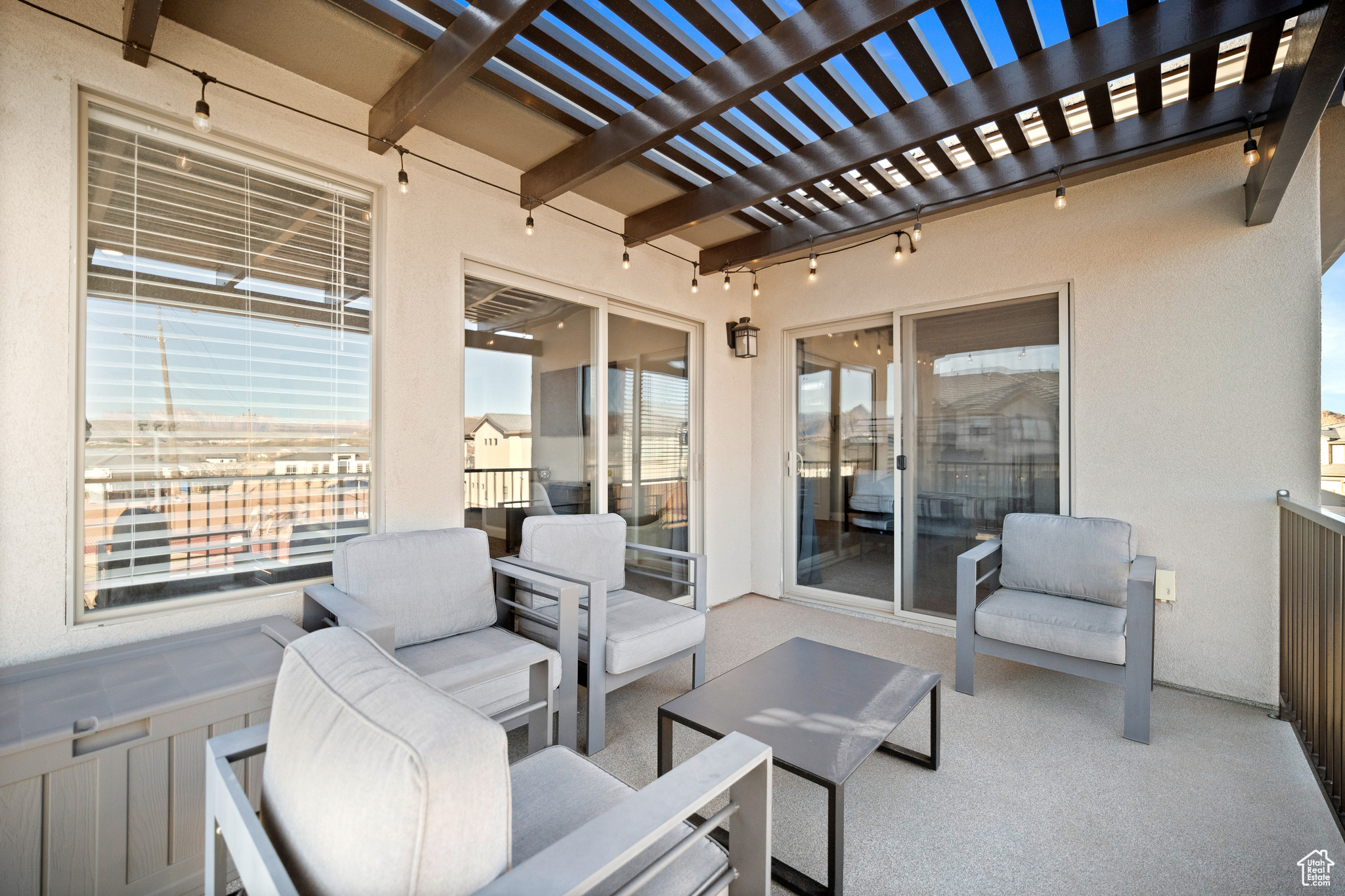 View of terrace featuring outdoor lounge area and a pergola