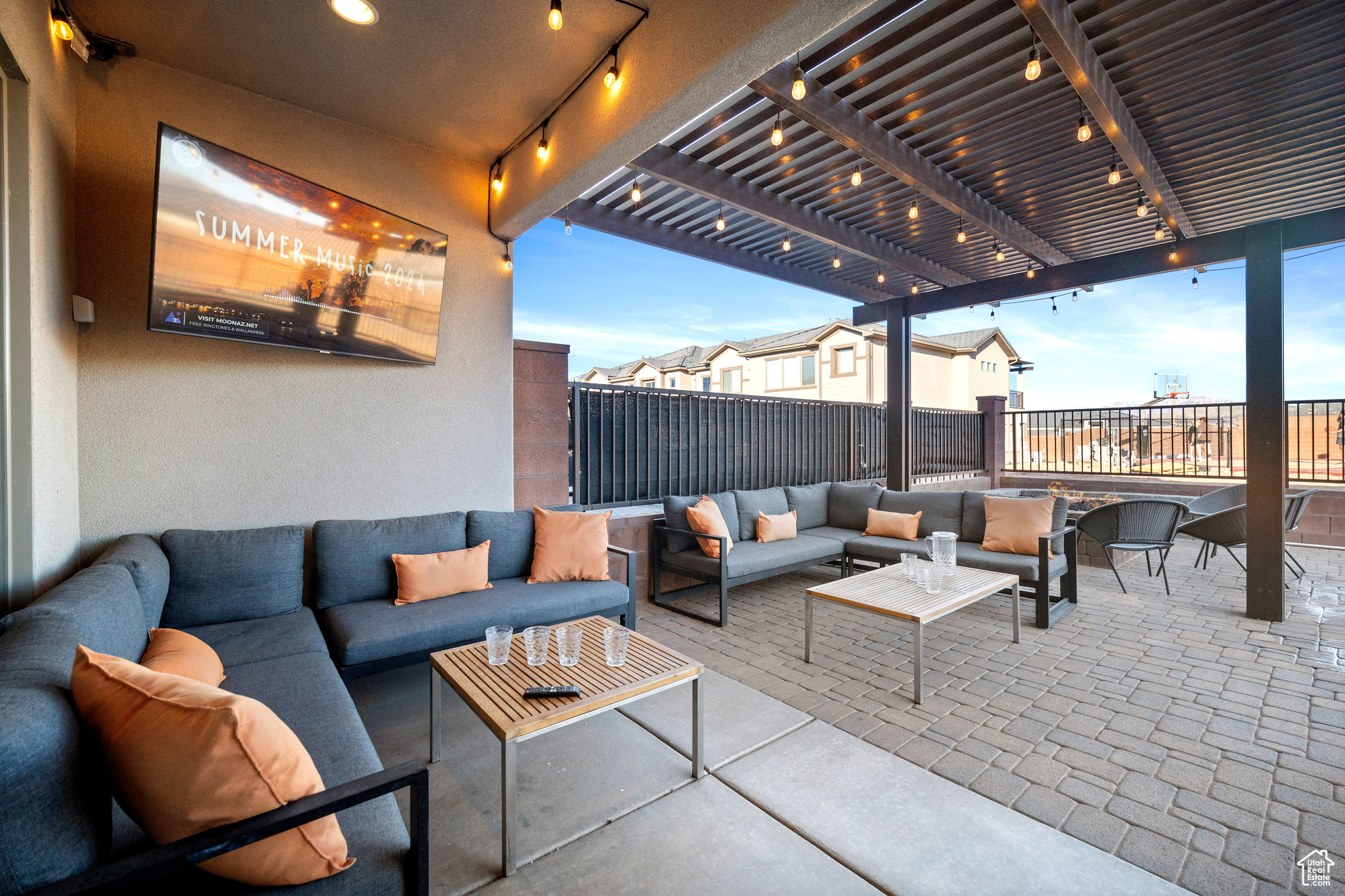 View of patio featuring outdoor lounge area and a pergola