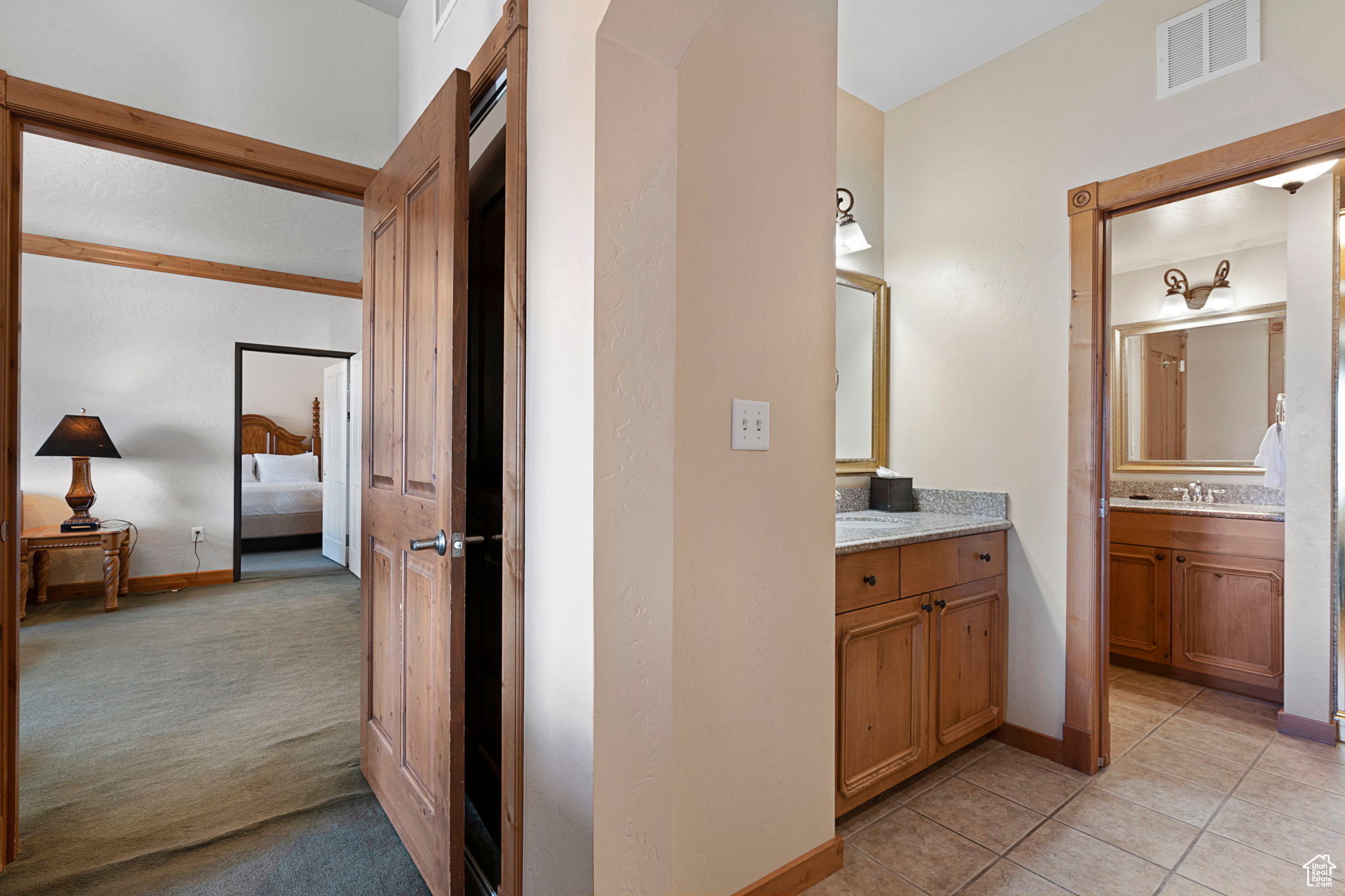 Bedroom 1, view into family room and the Full Bathroom Suite 1.