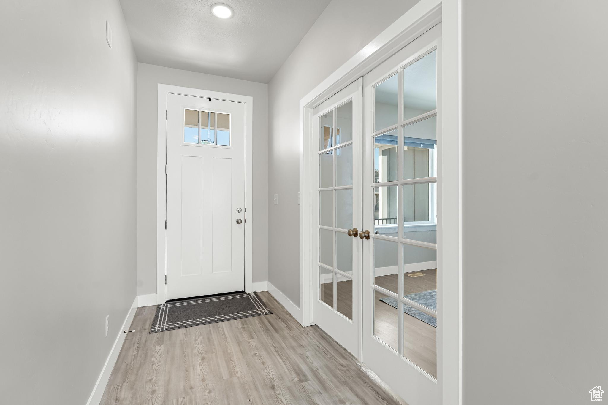 Upgraded Glass French Doors lead to a conveniently located Office or optional 6th bedroom next to the entry