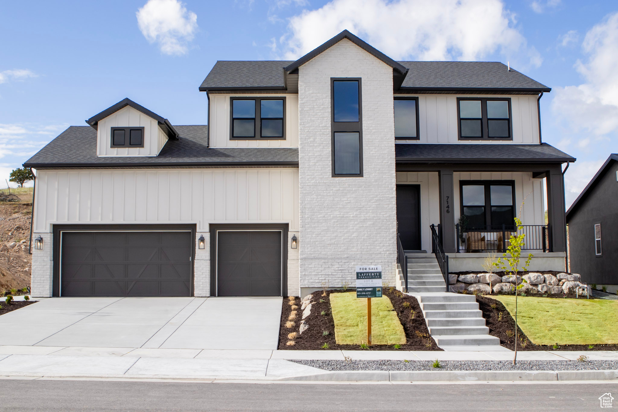 View of front of property with a garage