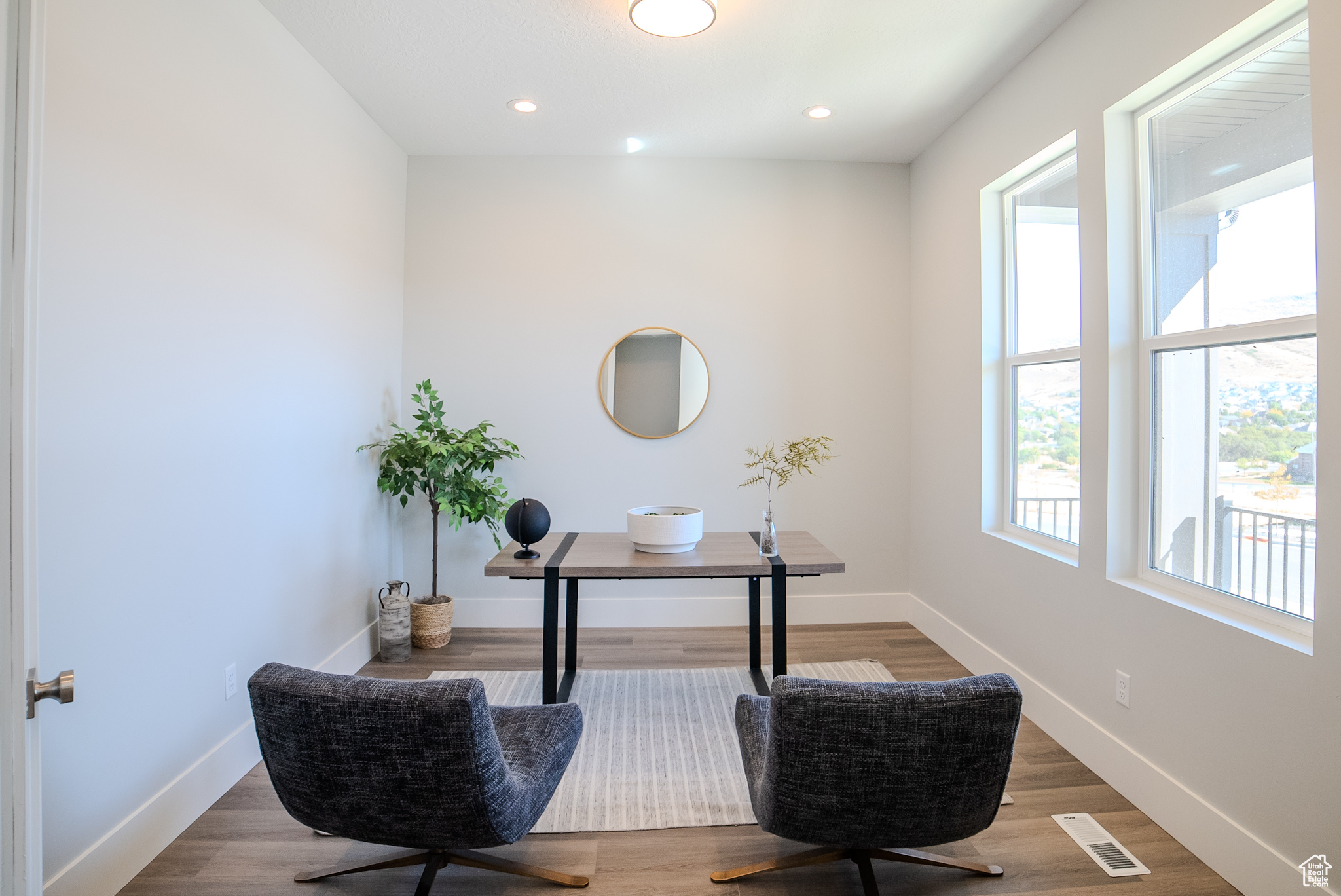 Home office featuring light hardwood / wood-style flooring