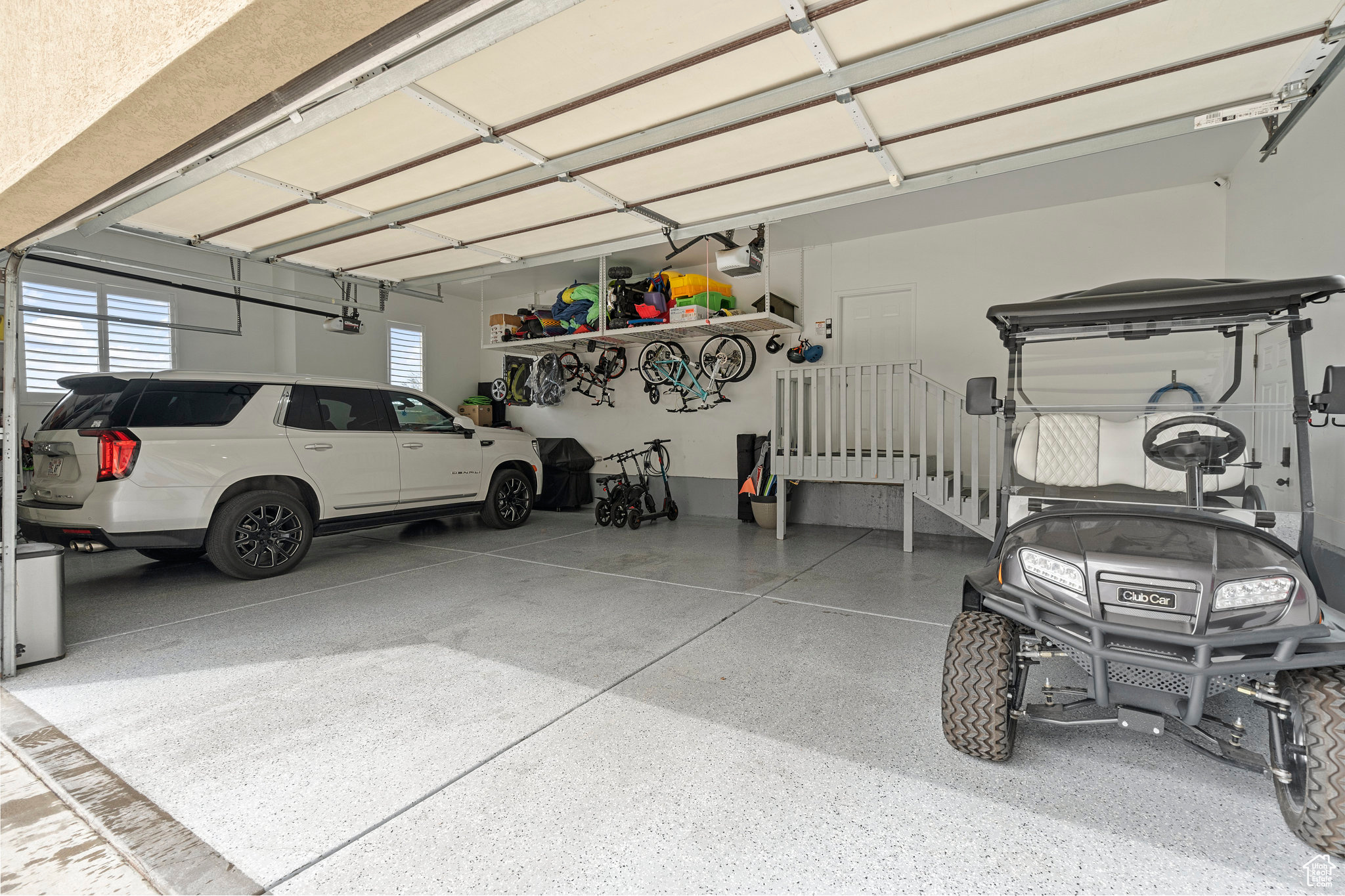 3-car garage with epoxy finishing