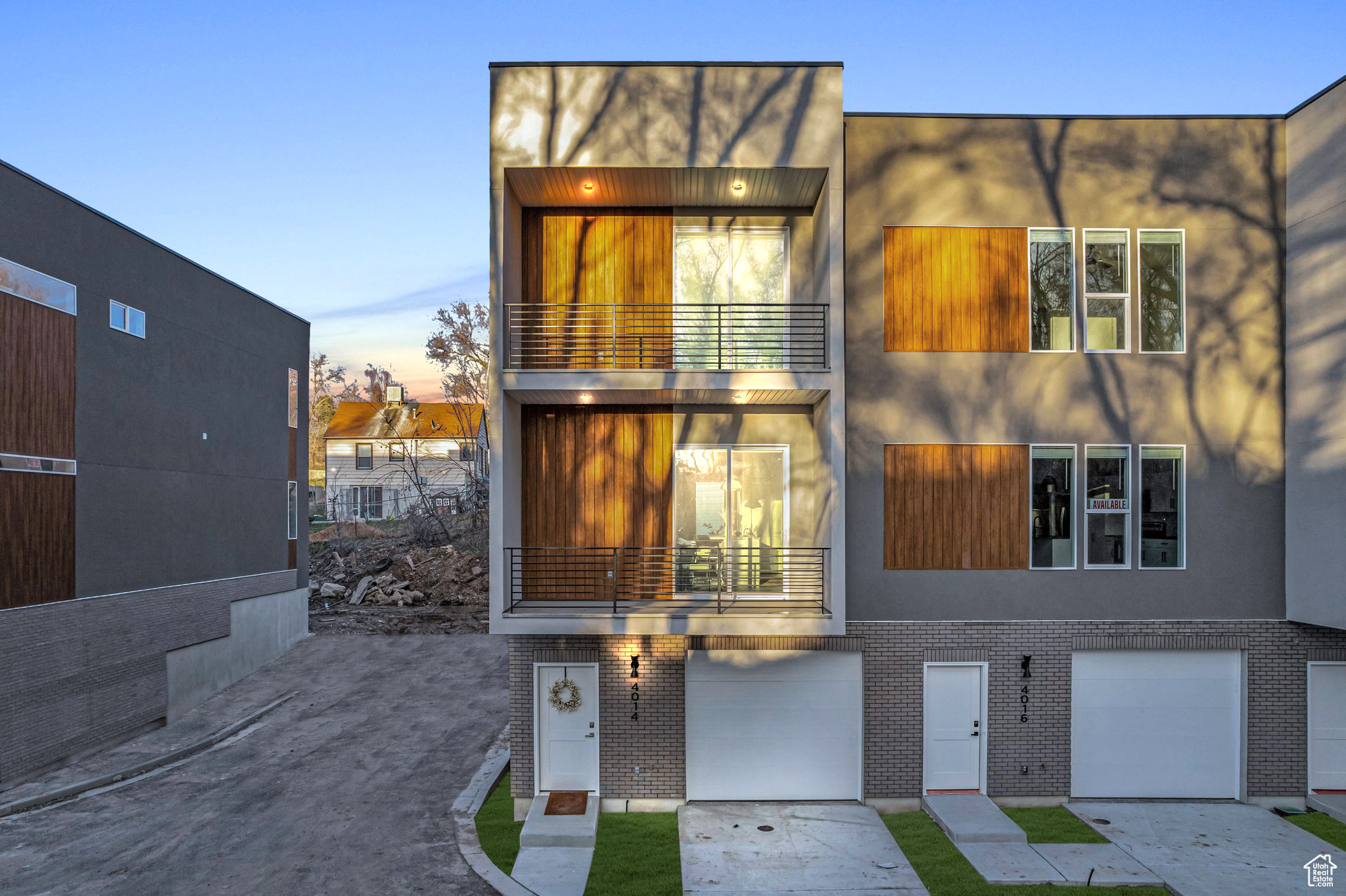 Contemporary house with a garage and a balcony