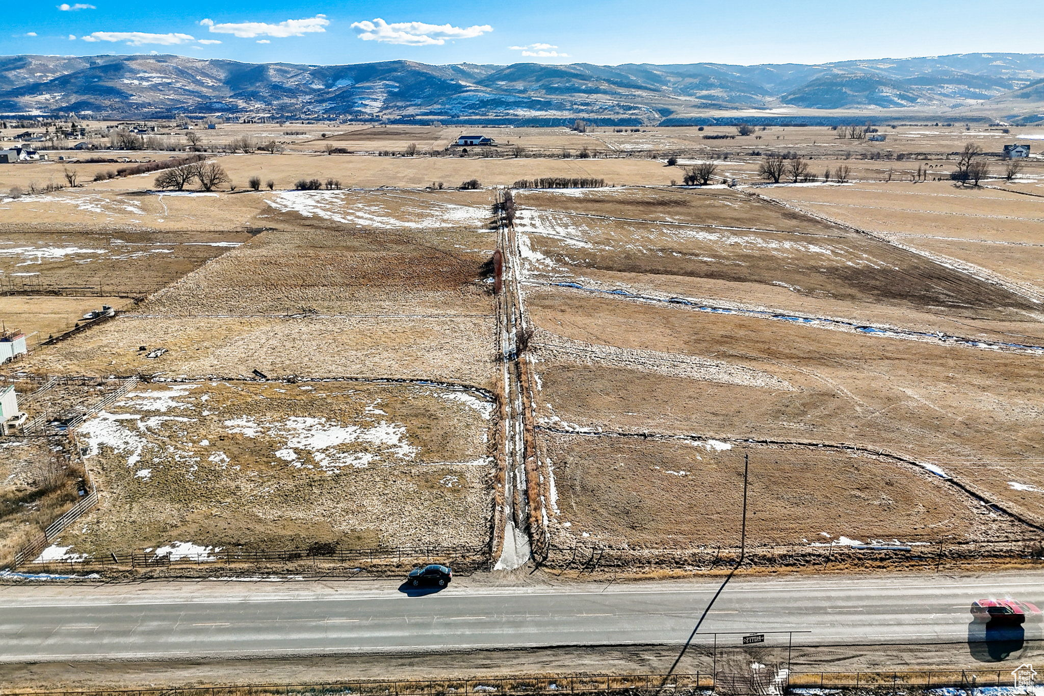 Drone / aerial view featuring a rural view and a mountain view