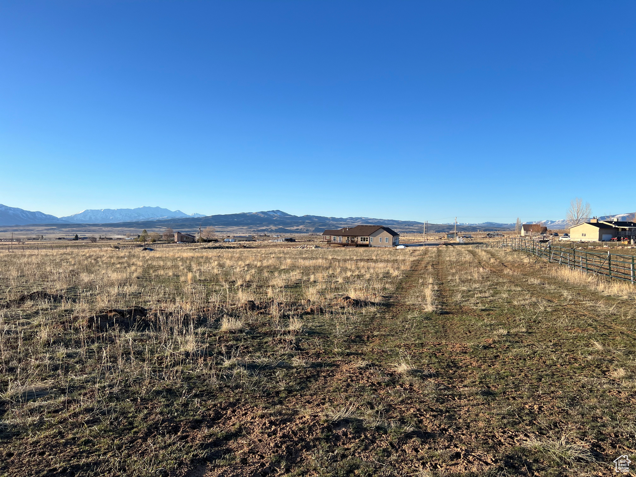 Property view of mountains with a rural view