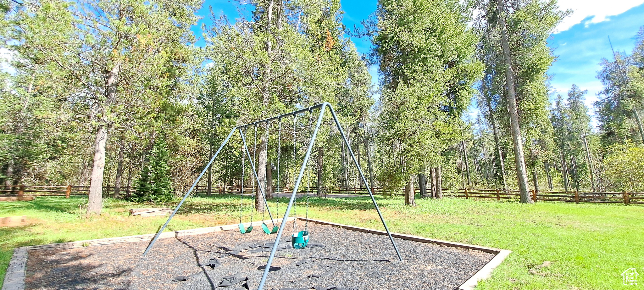 View of play area featuring a lawn