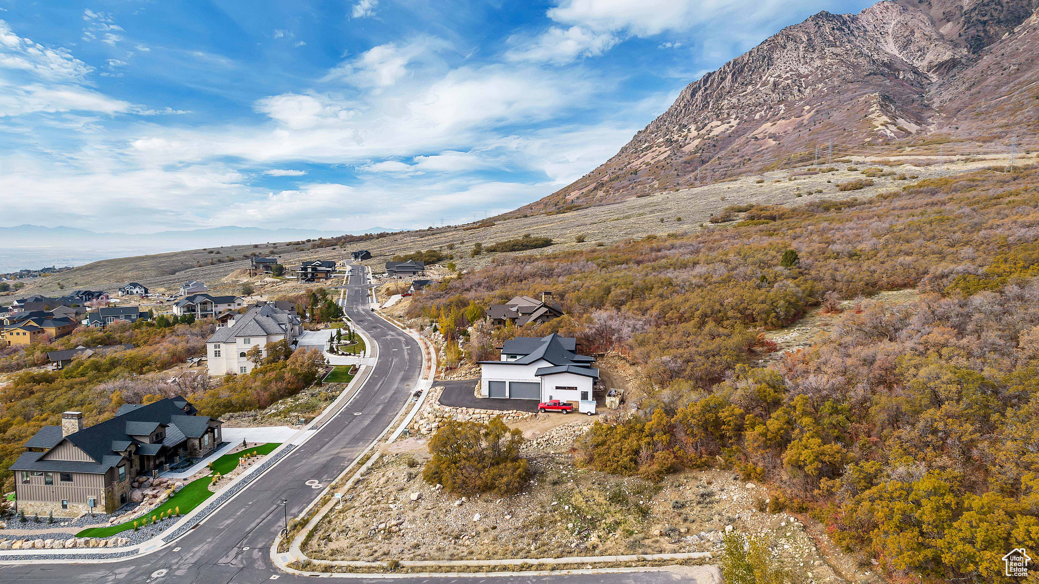 Birds eye view of property with a mountain view