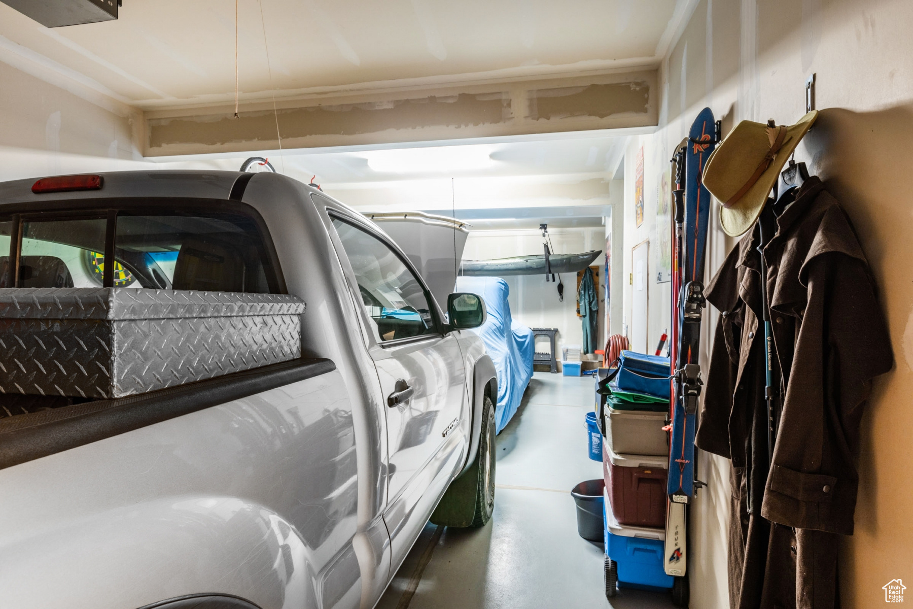 Tandem garage has PLENTY of space for full sized vehicles!