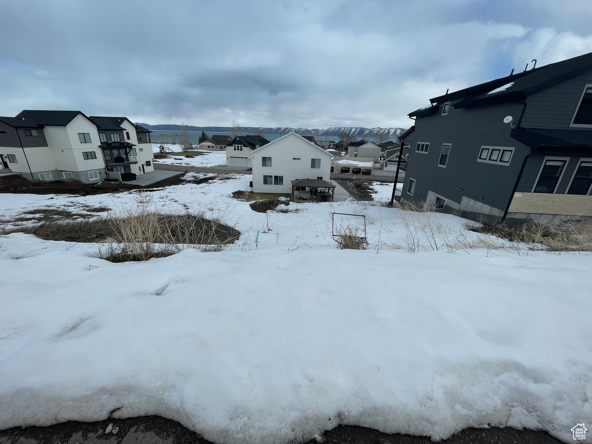 View of yard layered in snow