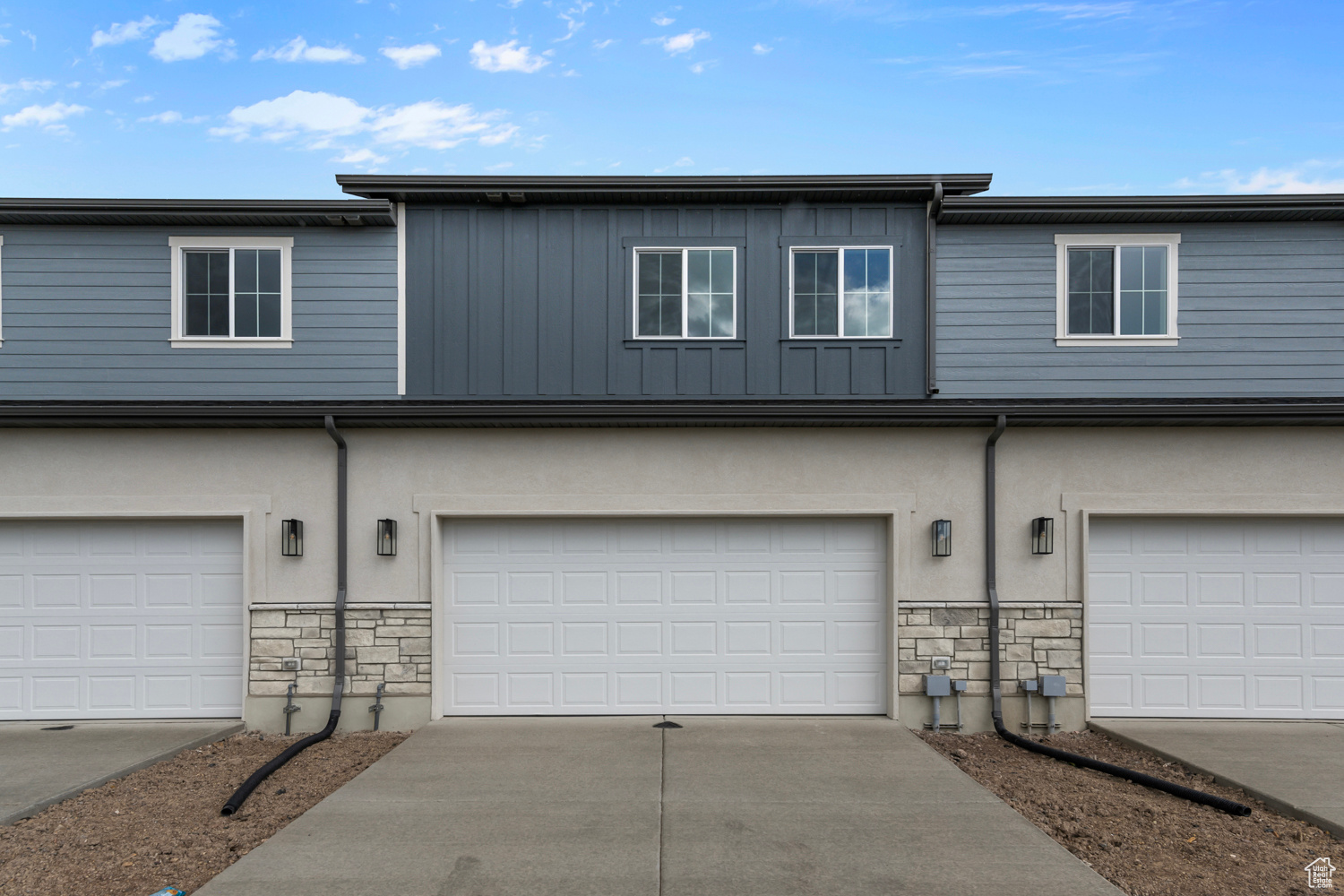 Multi unit property featuring a garage