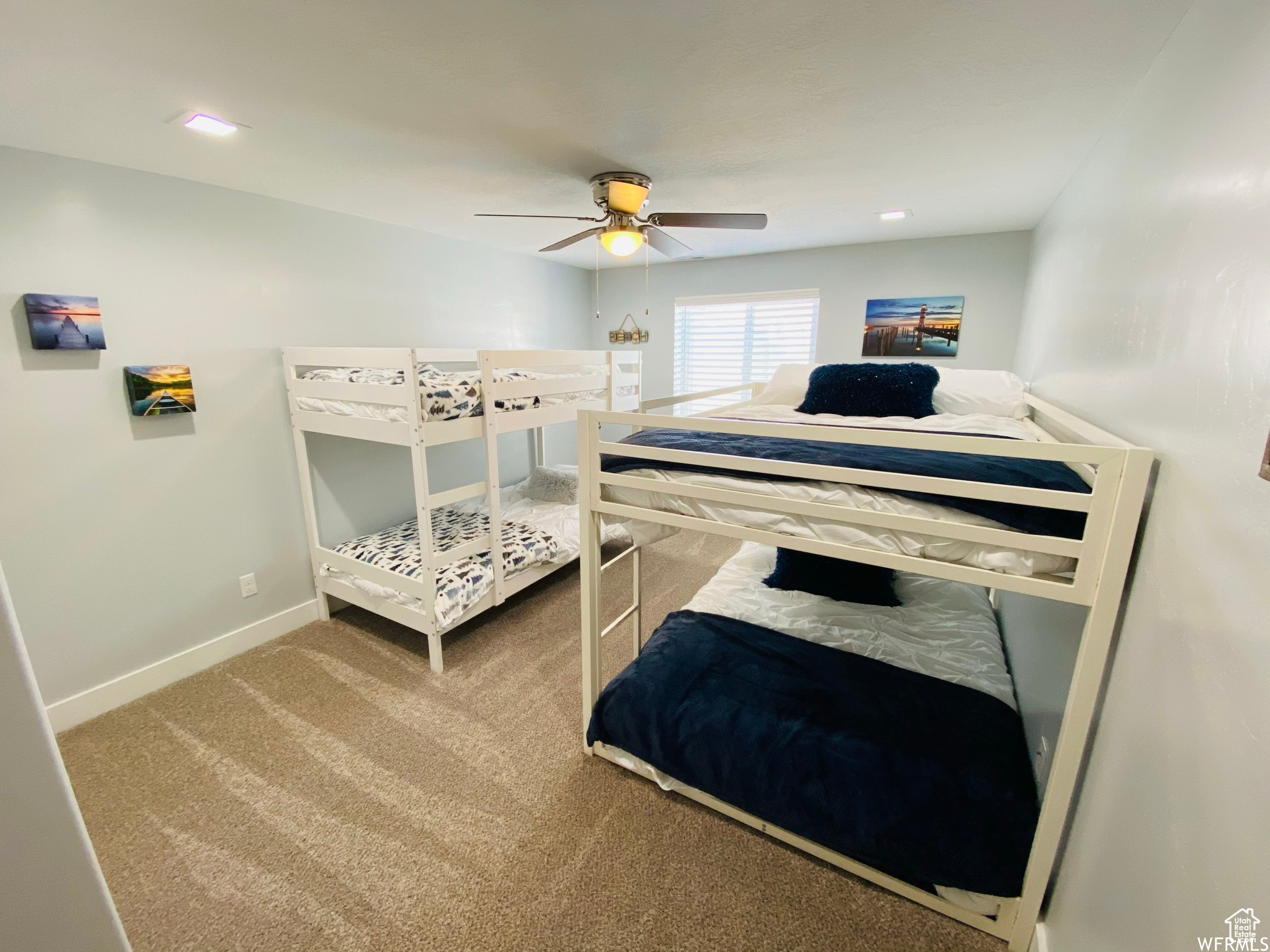 Bedroom with carpet floors and ceiling fan