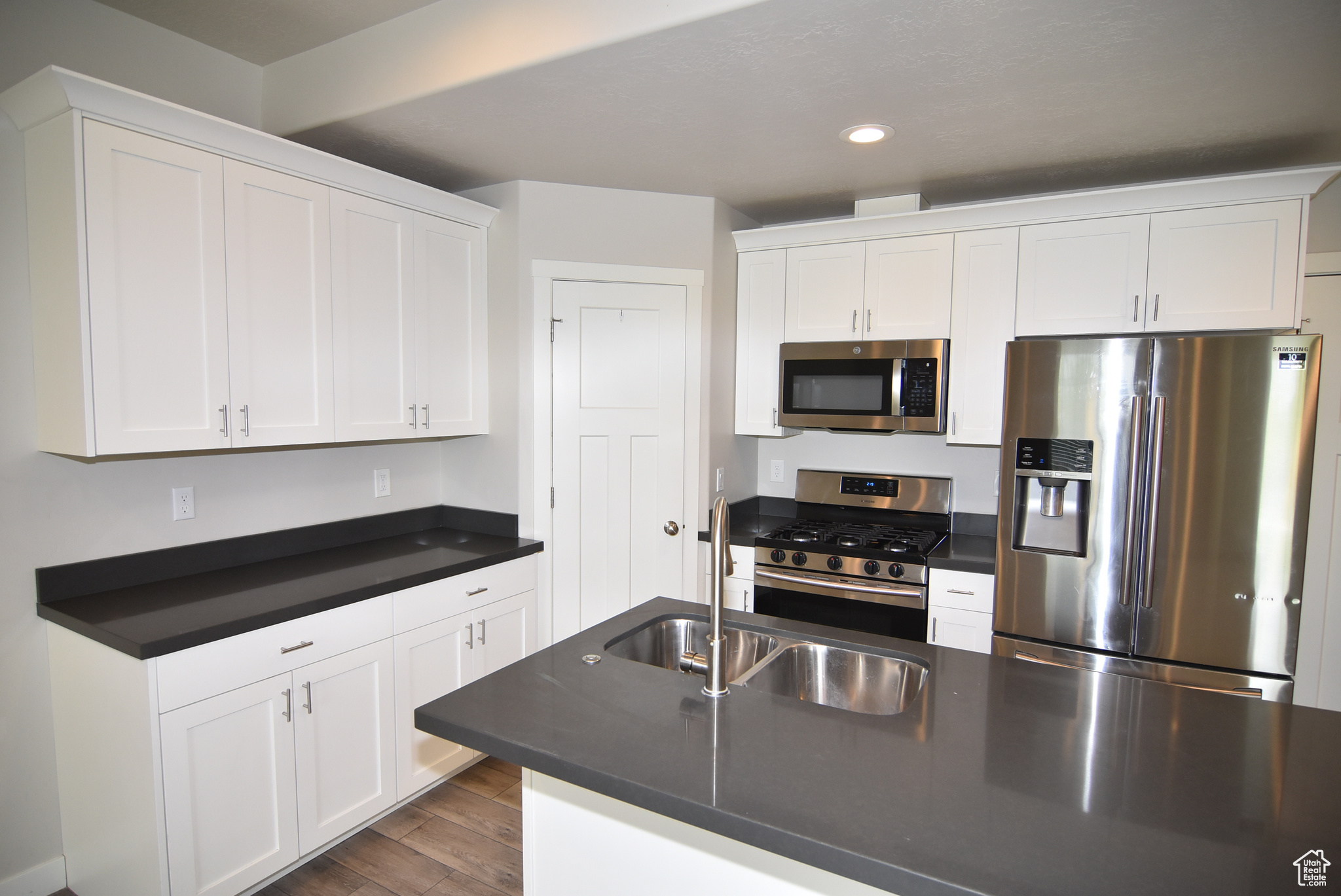 Kitchen with corner pantry