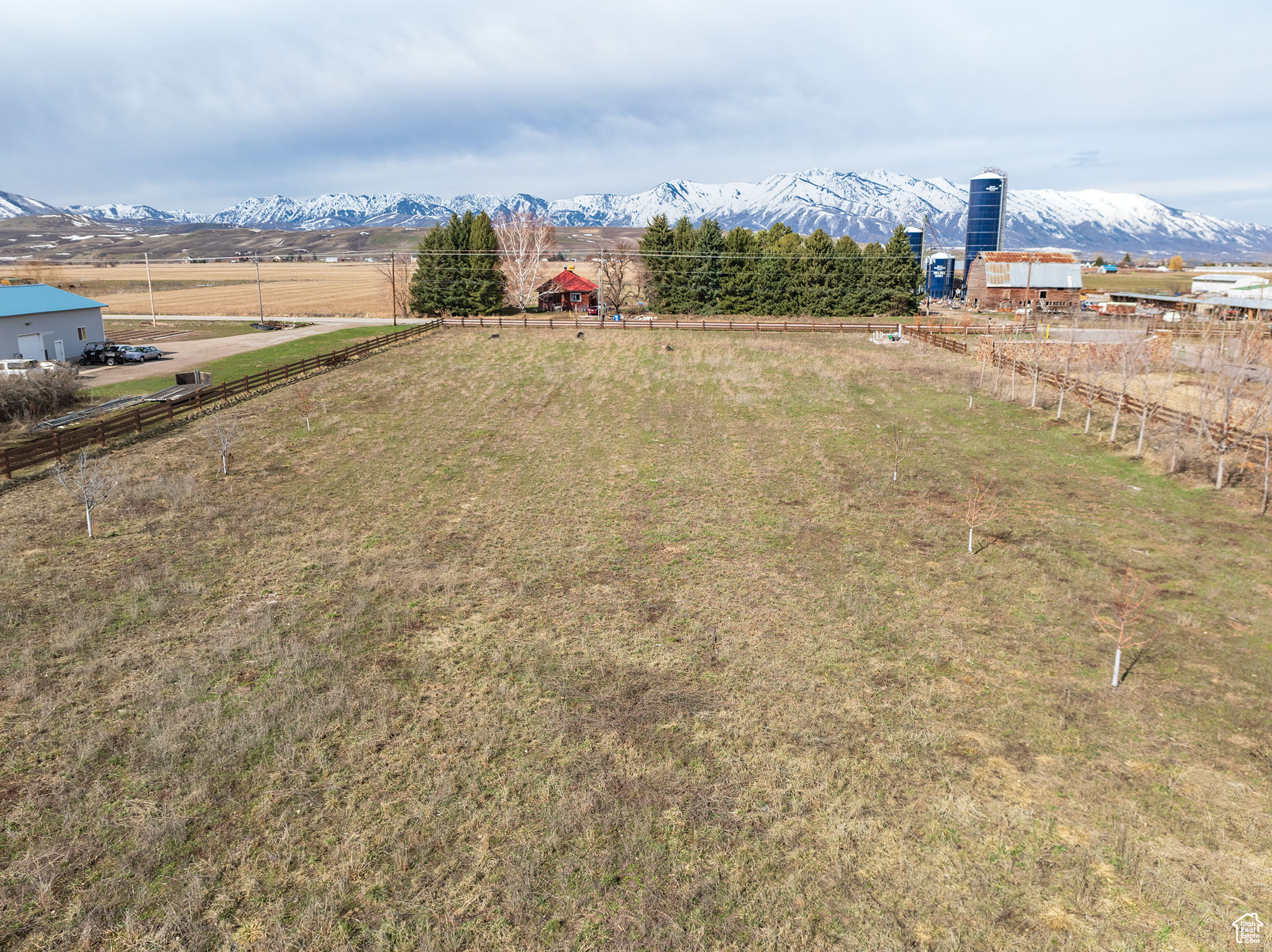 View of yard featuring a rural view and a mountain view