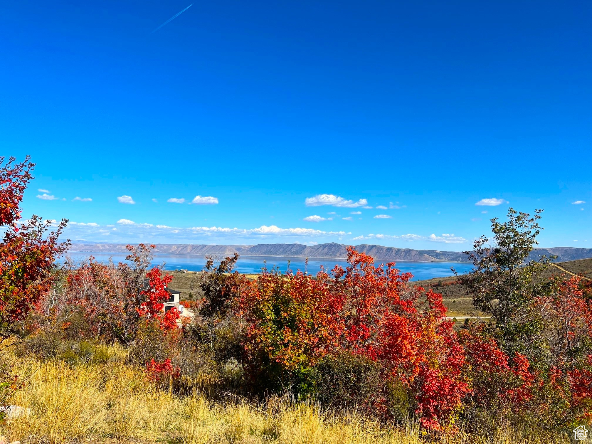 View of water feature with a mountain view