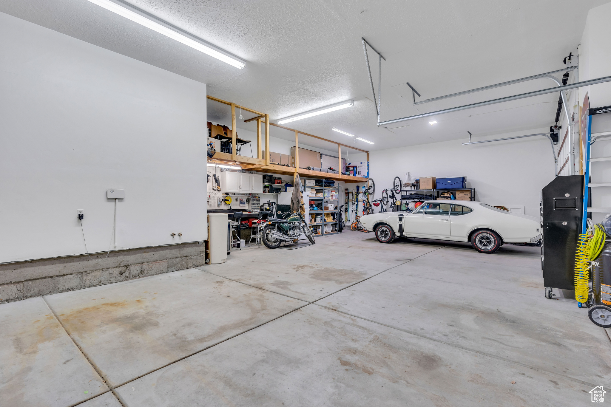 FOUR car garage with EV charger and storage above