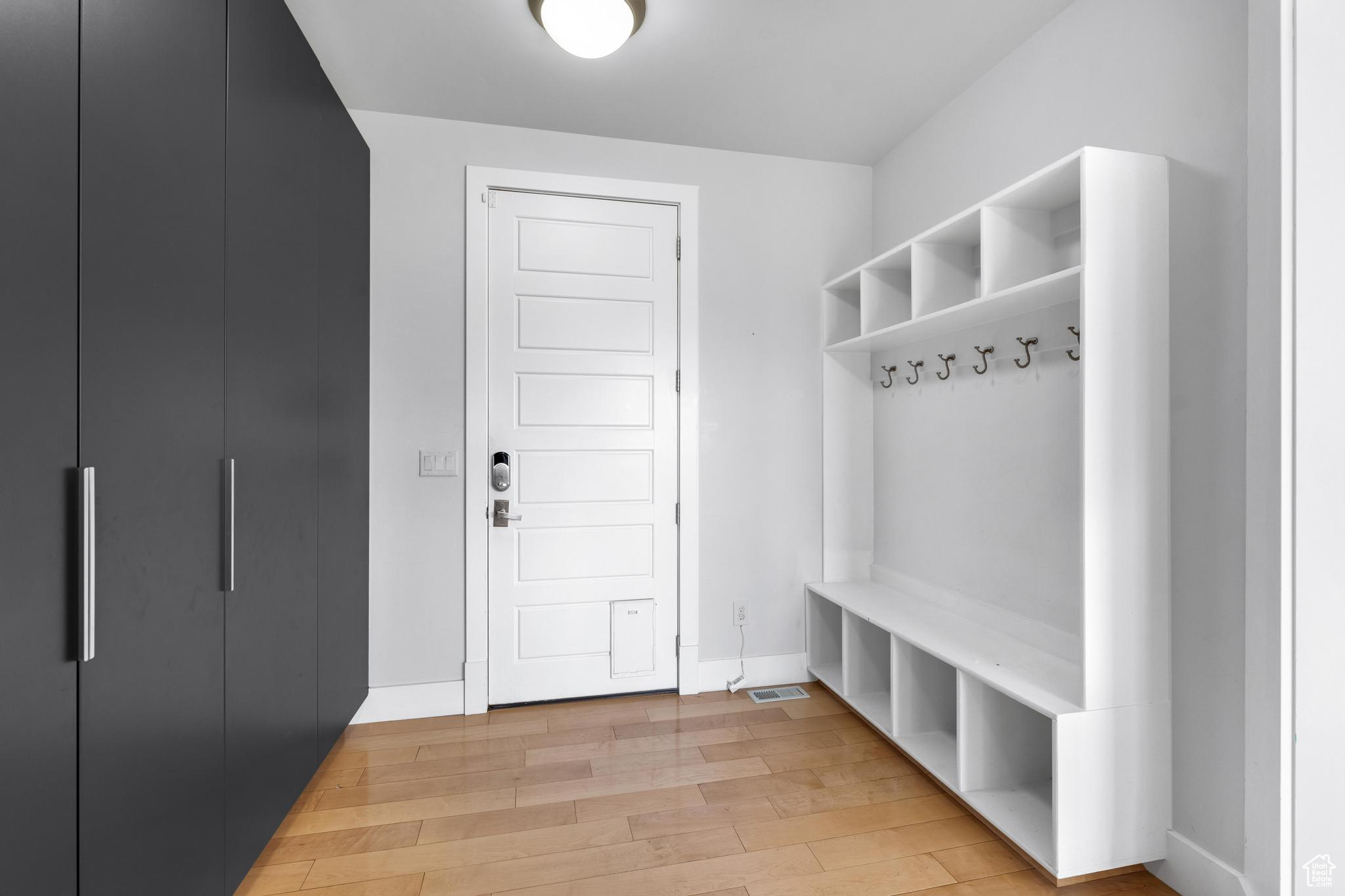 Mudroom featuring light hardwood / wood-style floors