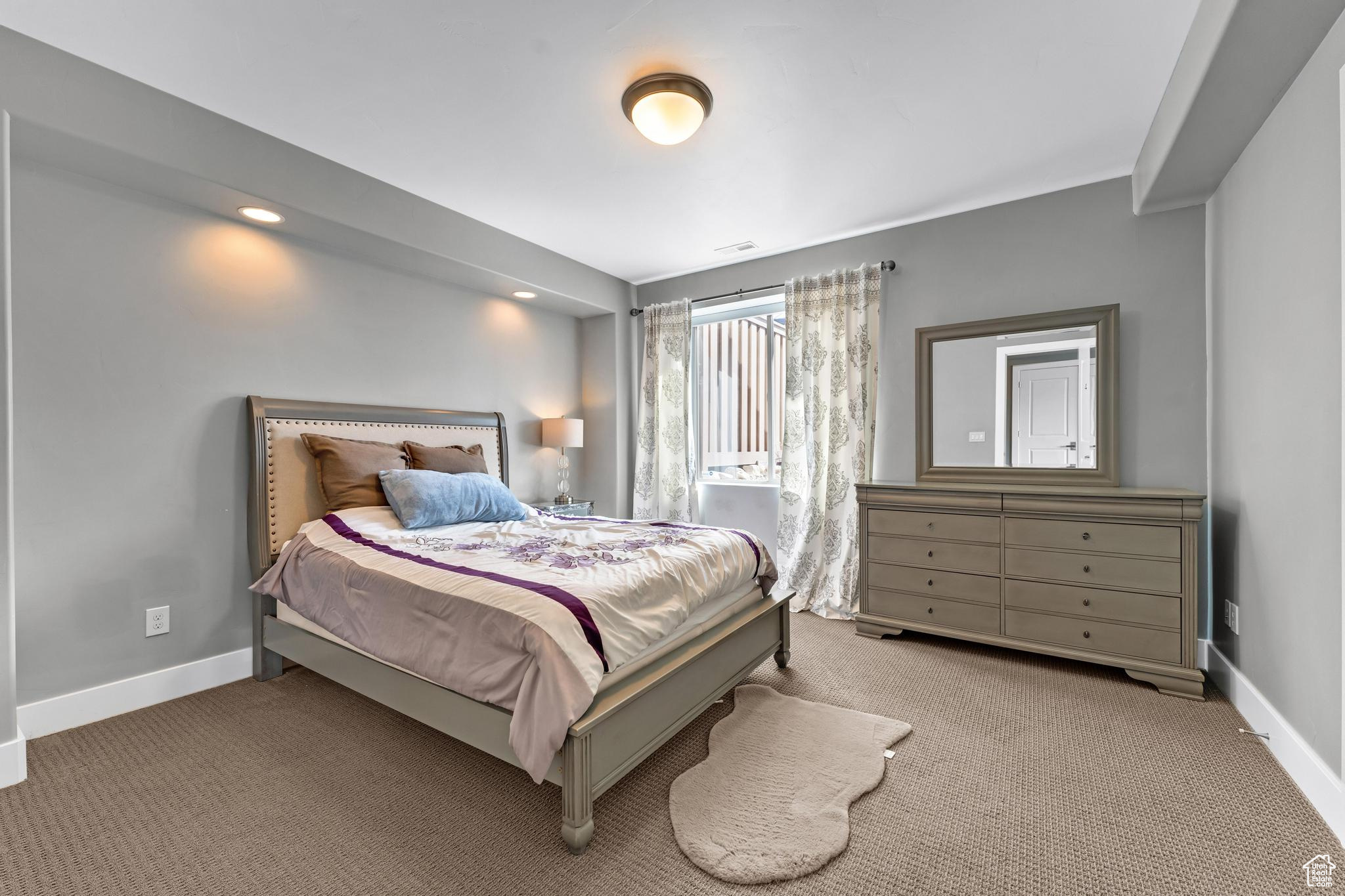 View of carpeted bedroom