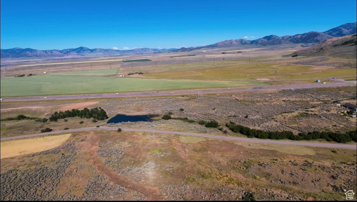 Property view of mountains featuring a rural view