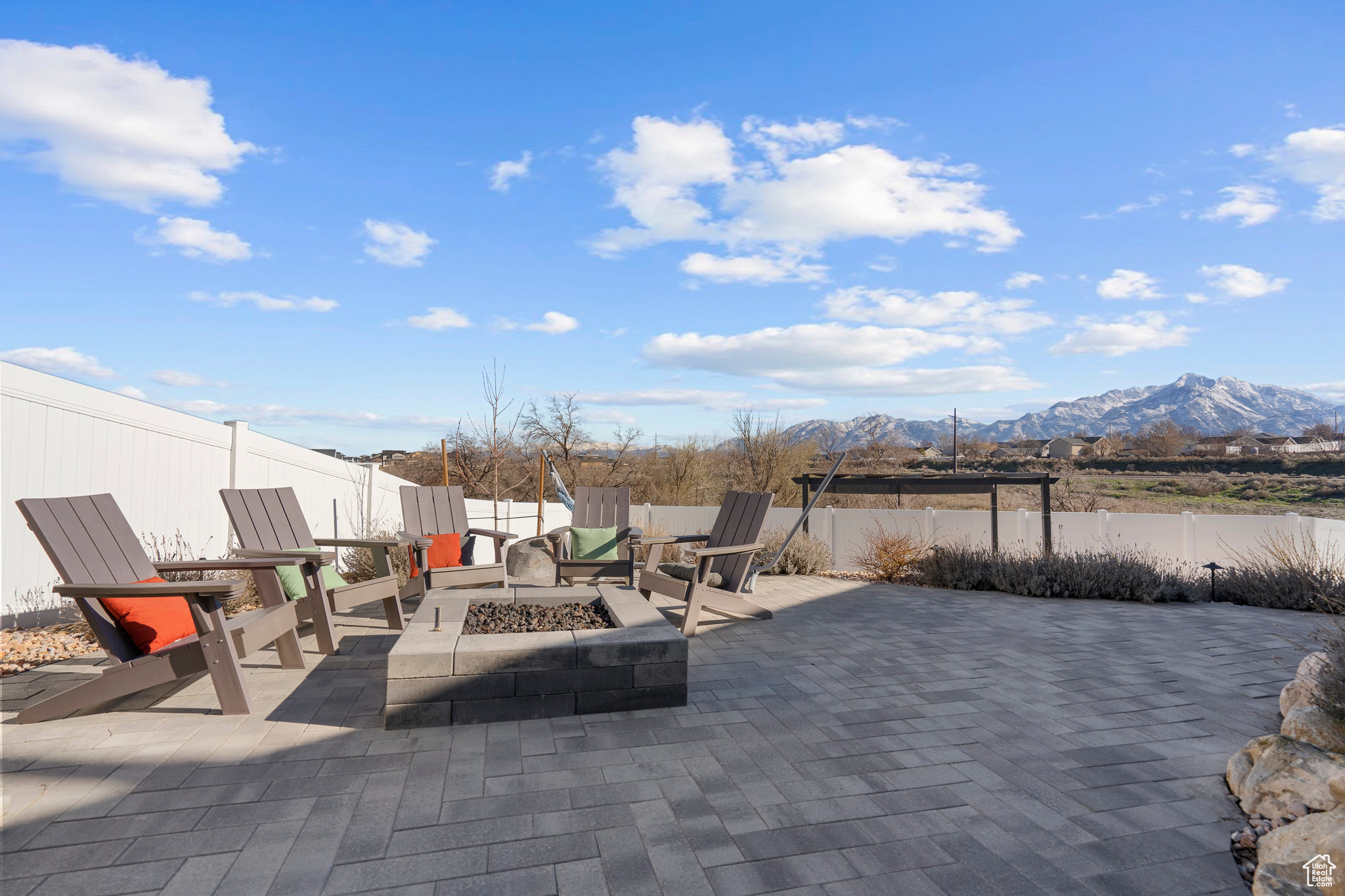 View of patio / terrace featuring a mountain view and an outdoor fire pit