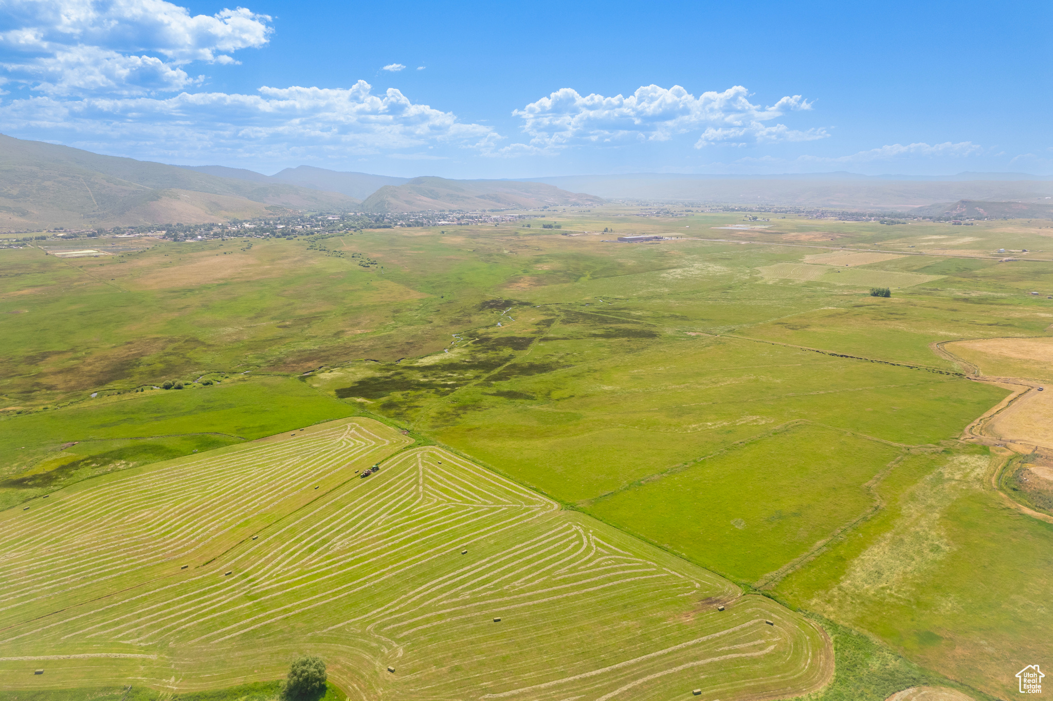 Birds eye view of property featuring a mountain view and a rural view