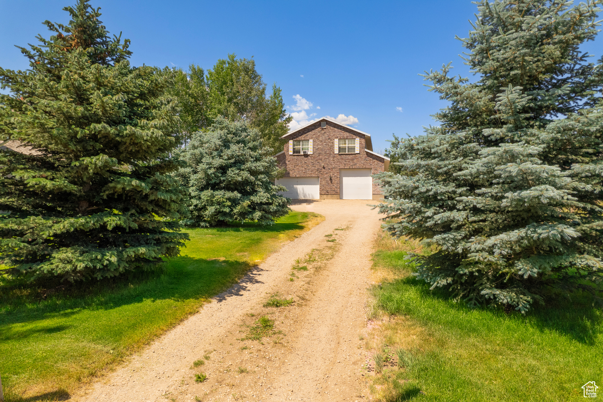 View of front of home featuring a garage