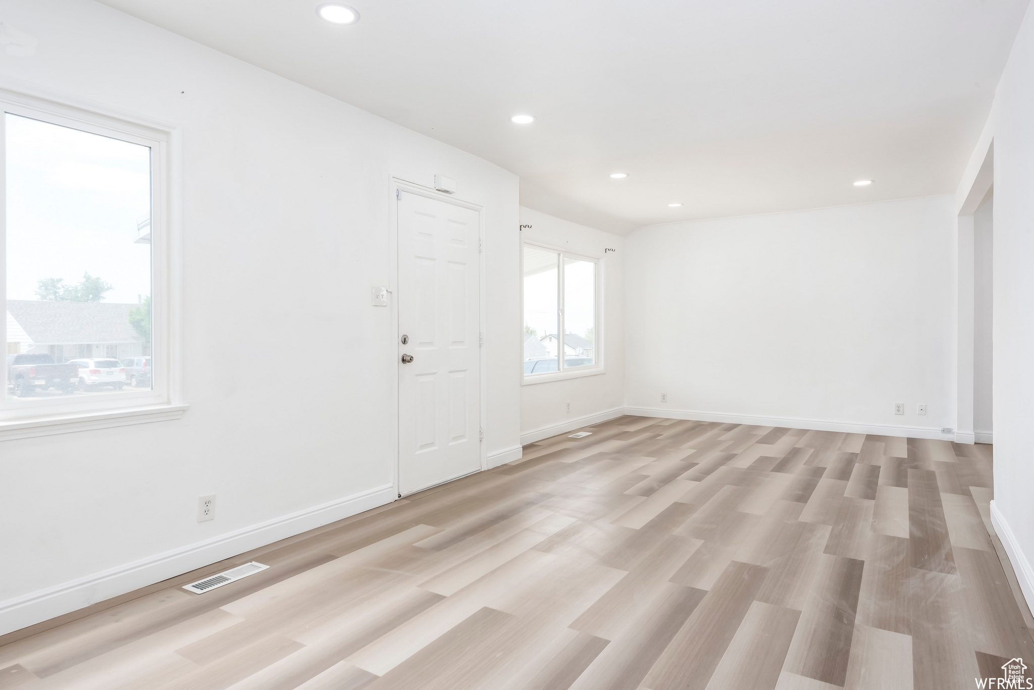 Unfurnished room featuring light hardwood / wood-style floors