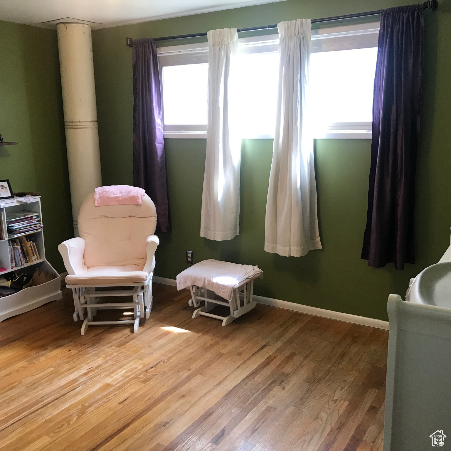 Living area with hardwood / wood-style flooring