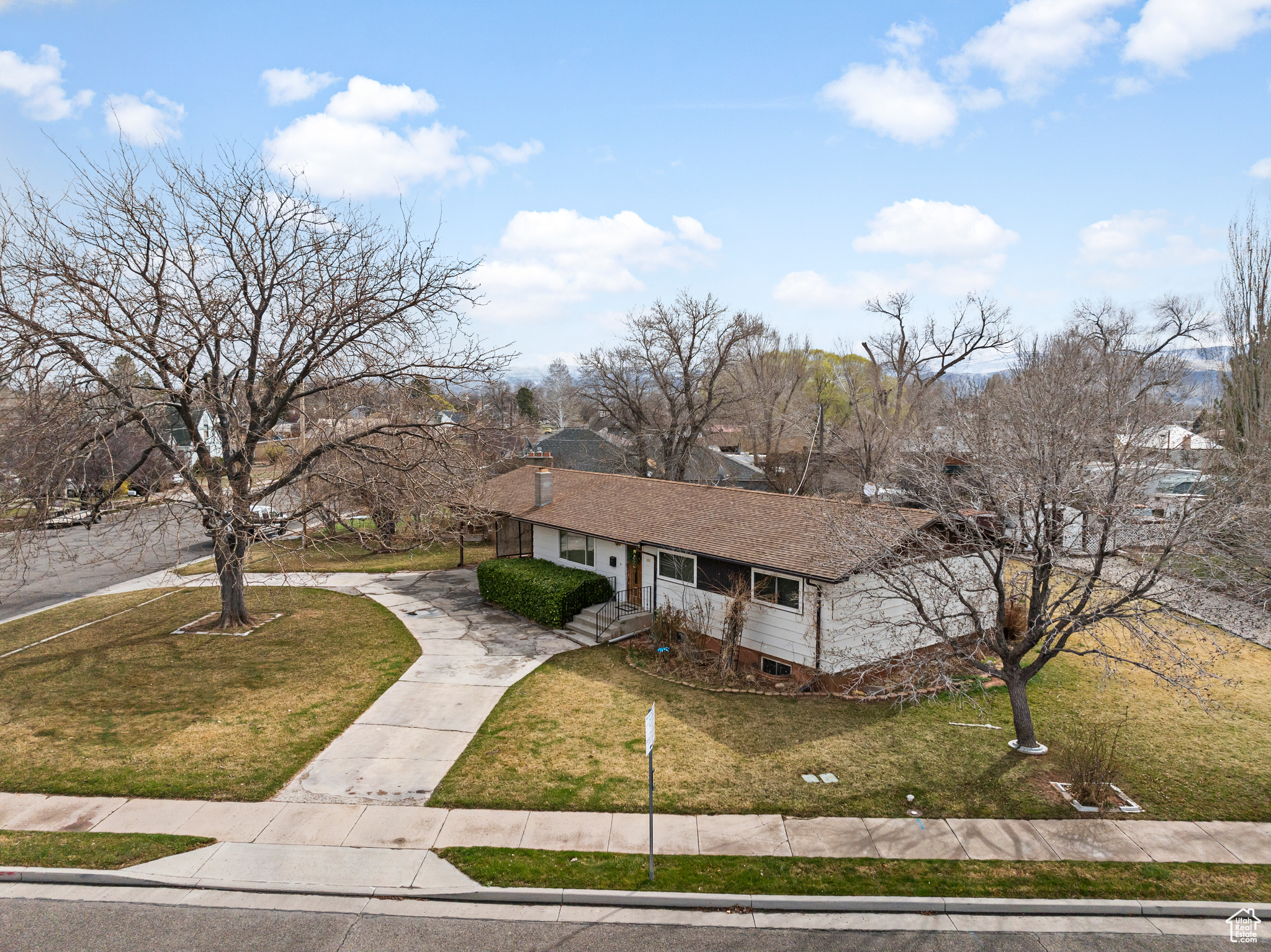 View of front of property with a front lawn