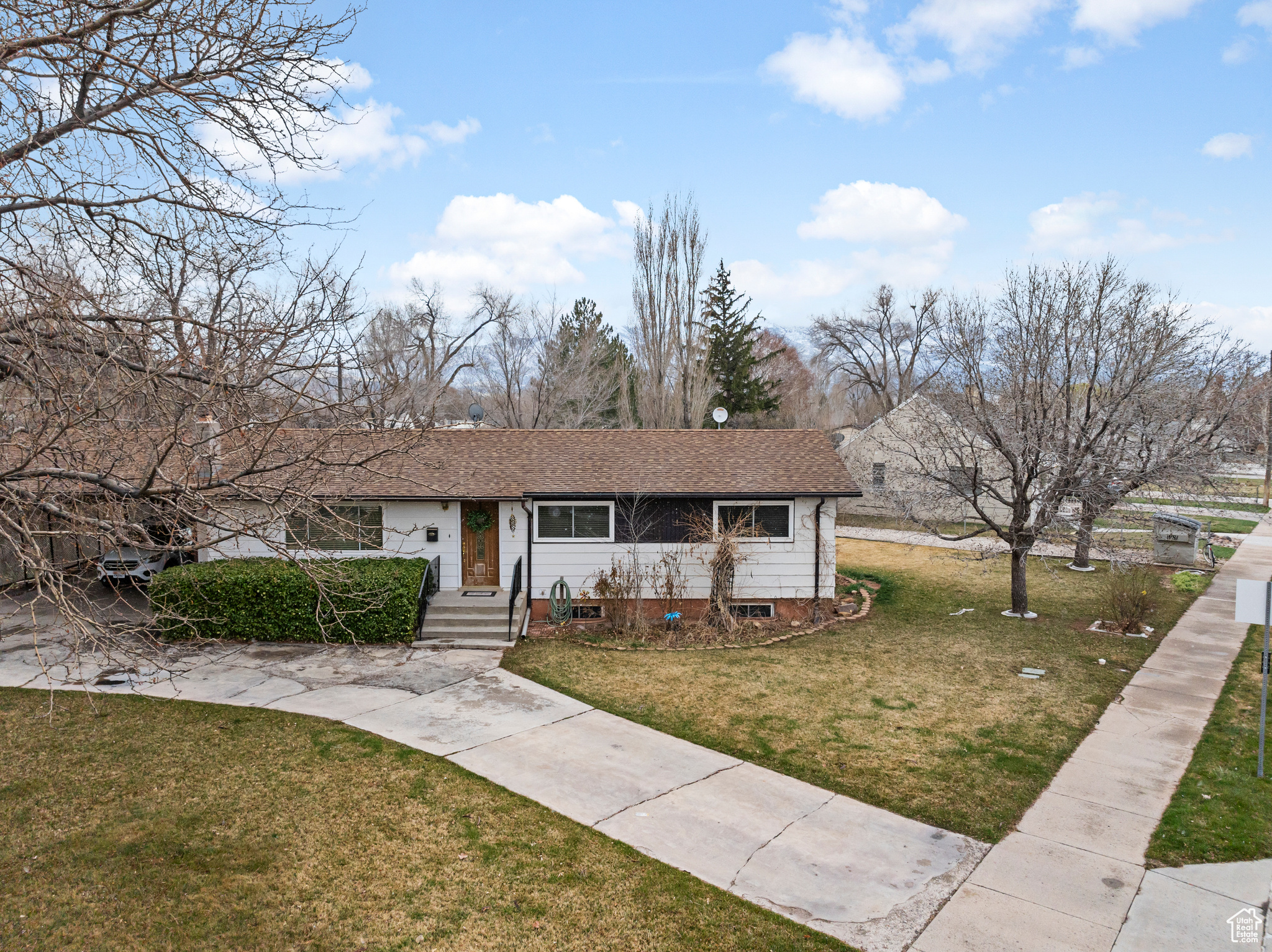 View of front of property with a front lawn