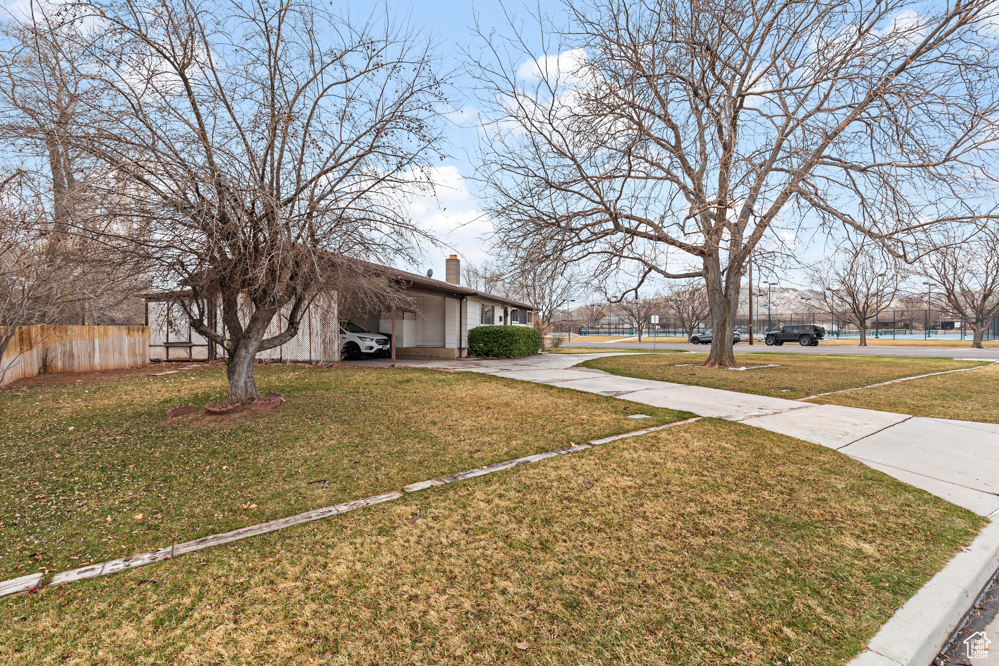 View of yard featuring a carport