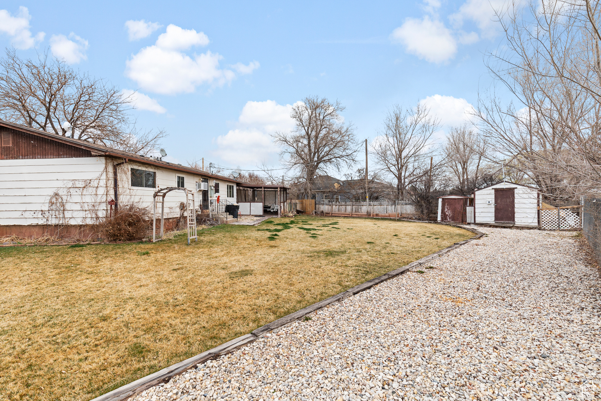 View of yard featuring a storage shed