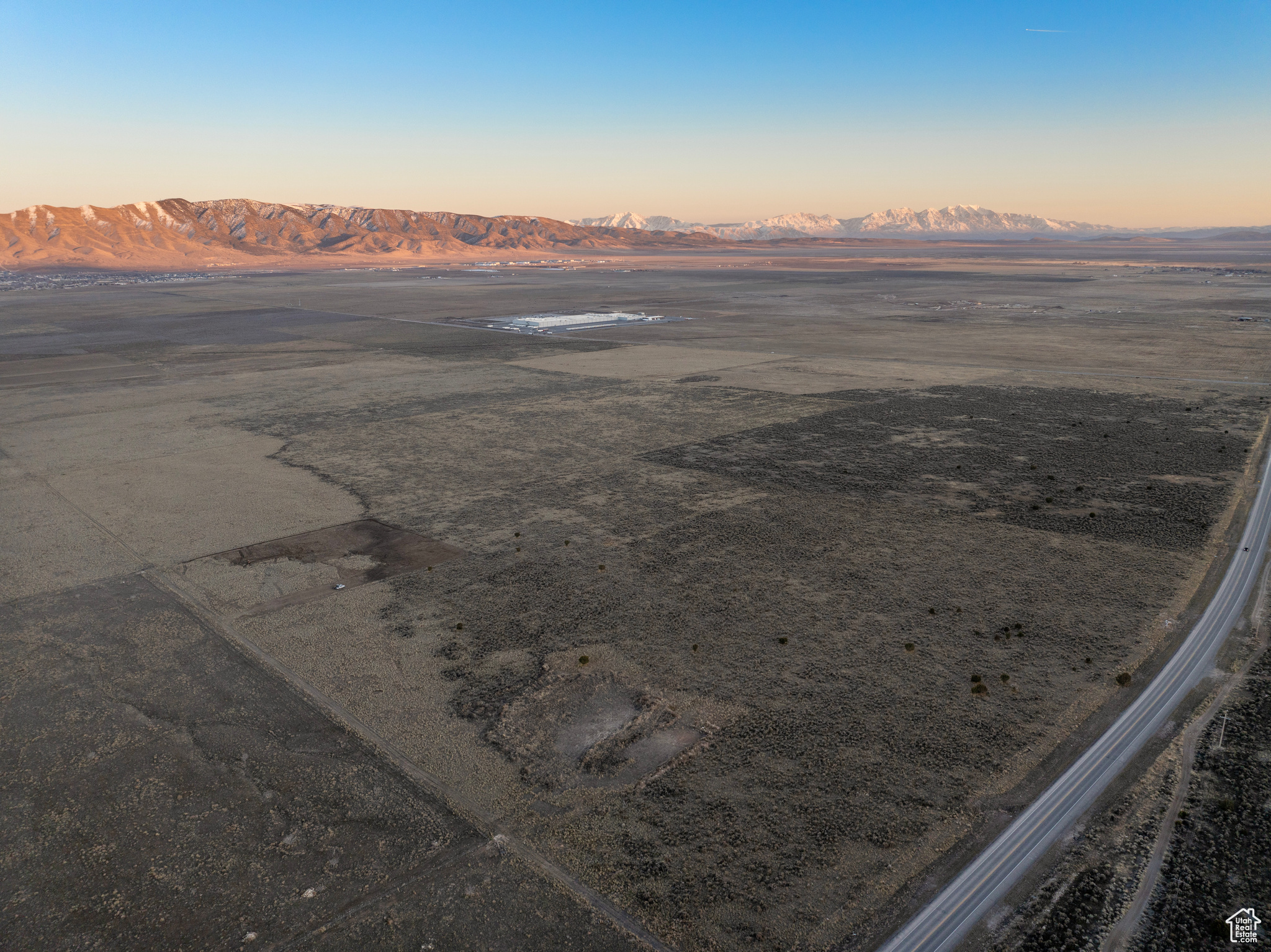 Aerial view at dusk with a mountain view