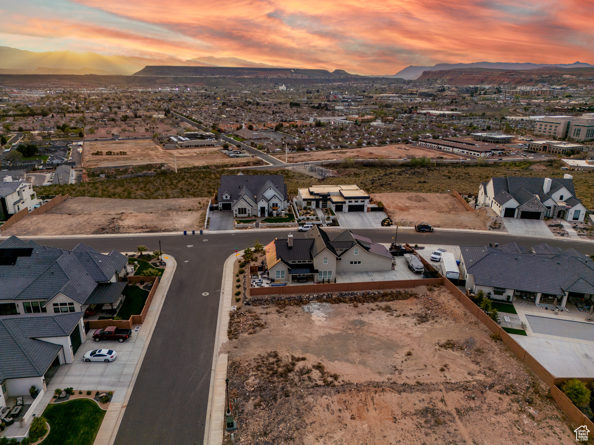 Aerial view at dusk featuring a mountain view