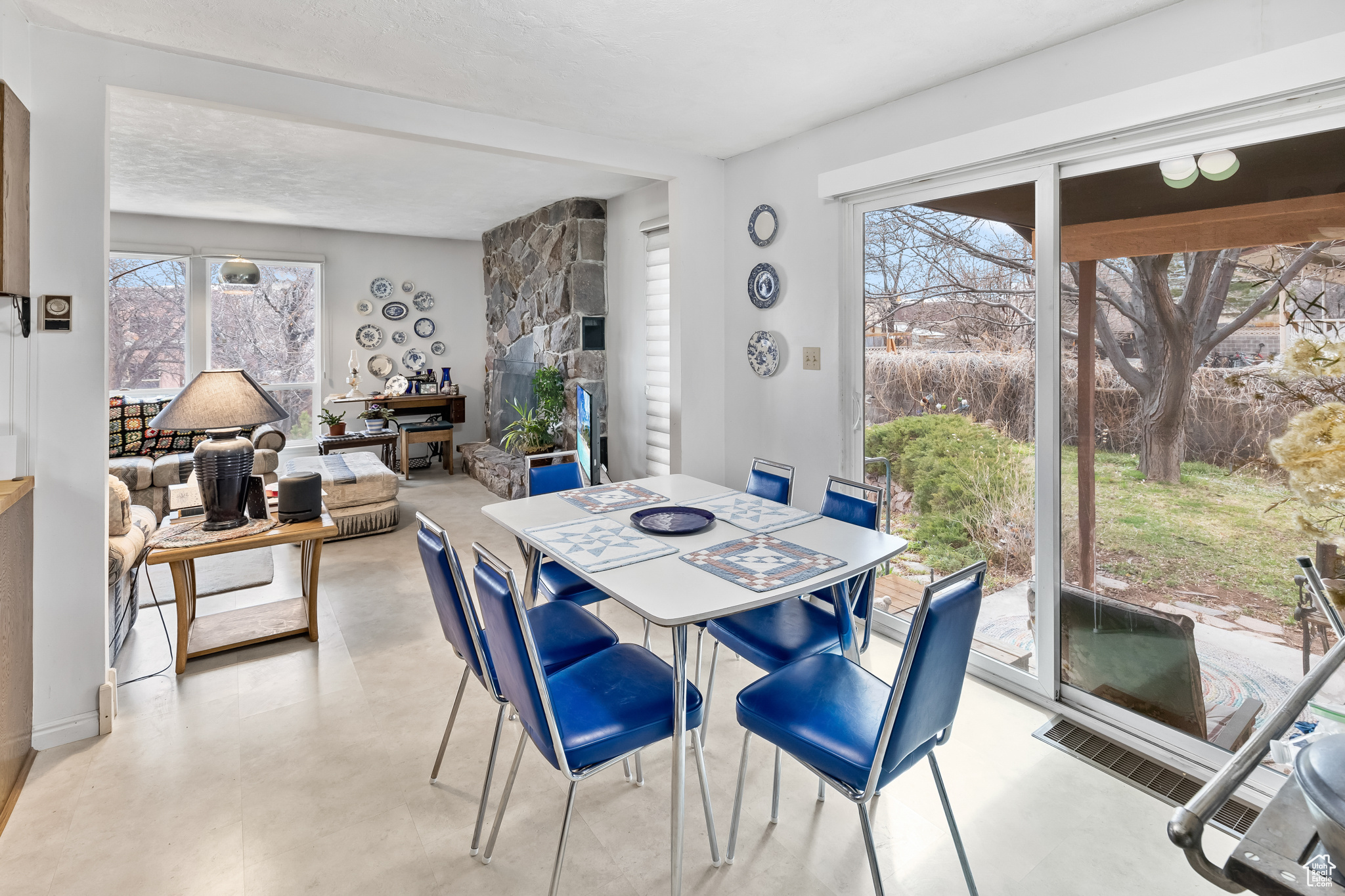 Dining area with a textured ceiling