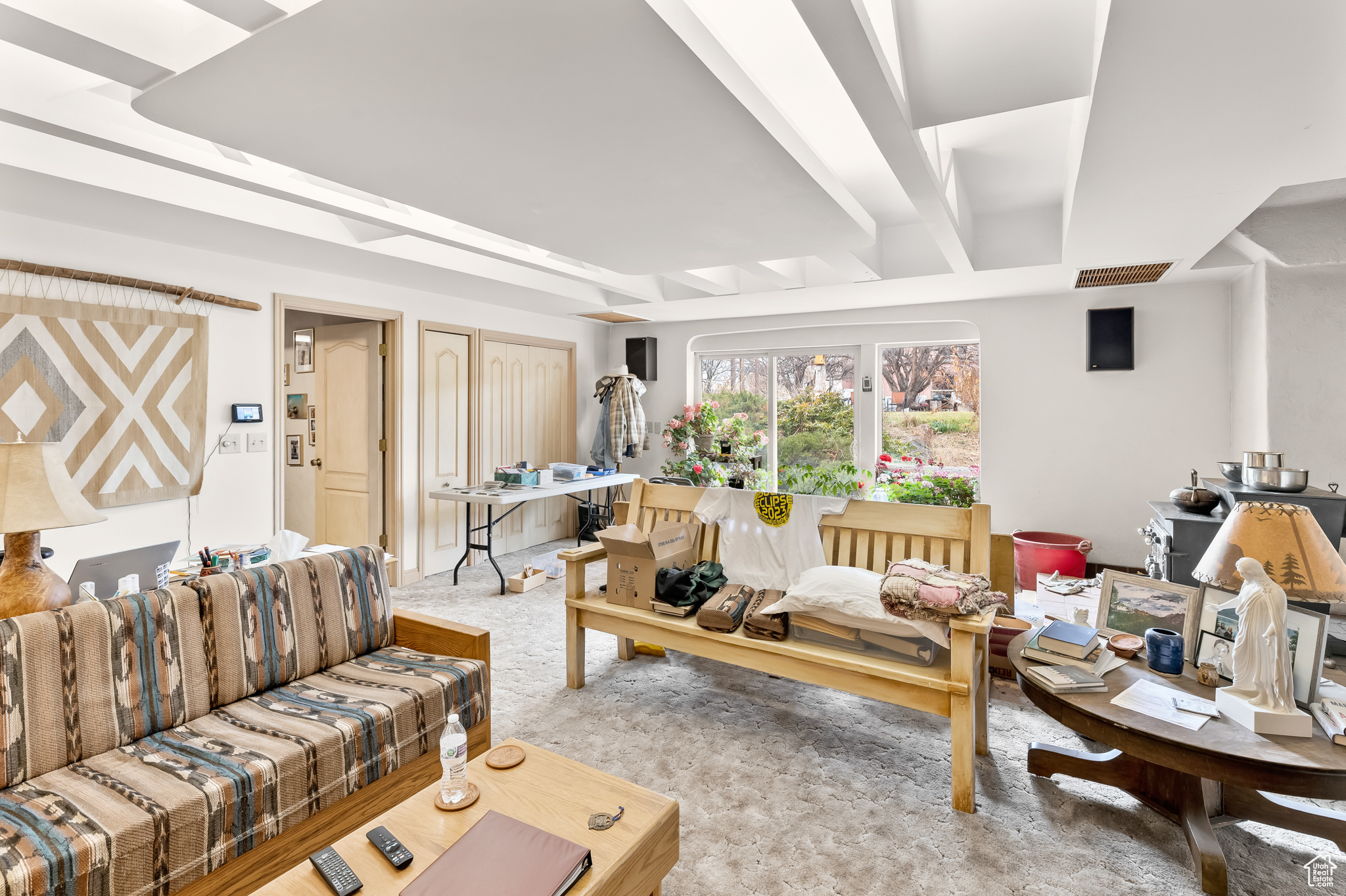 Living room featuring light colored carpet