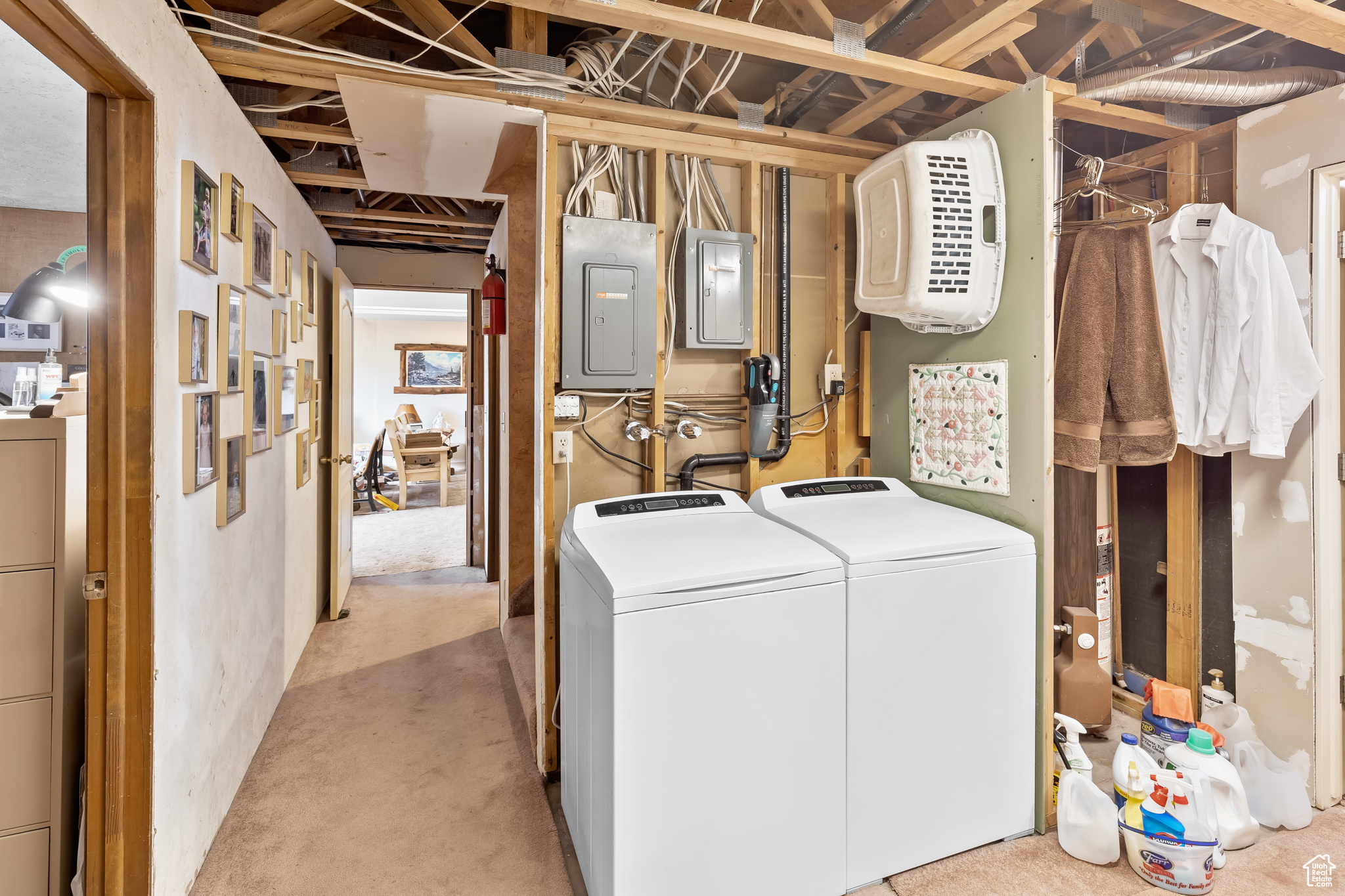 Washroom featuring independent washer and dryer