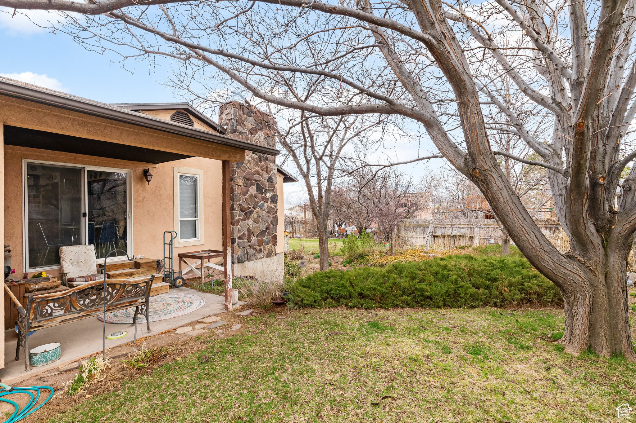 View of yard with a patio