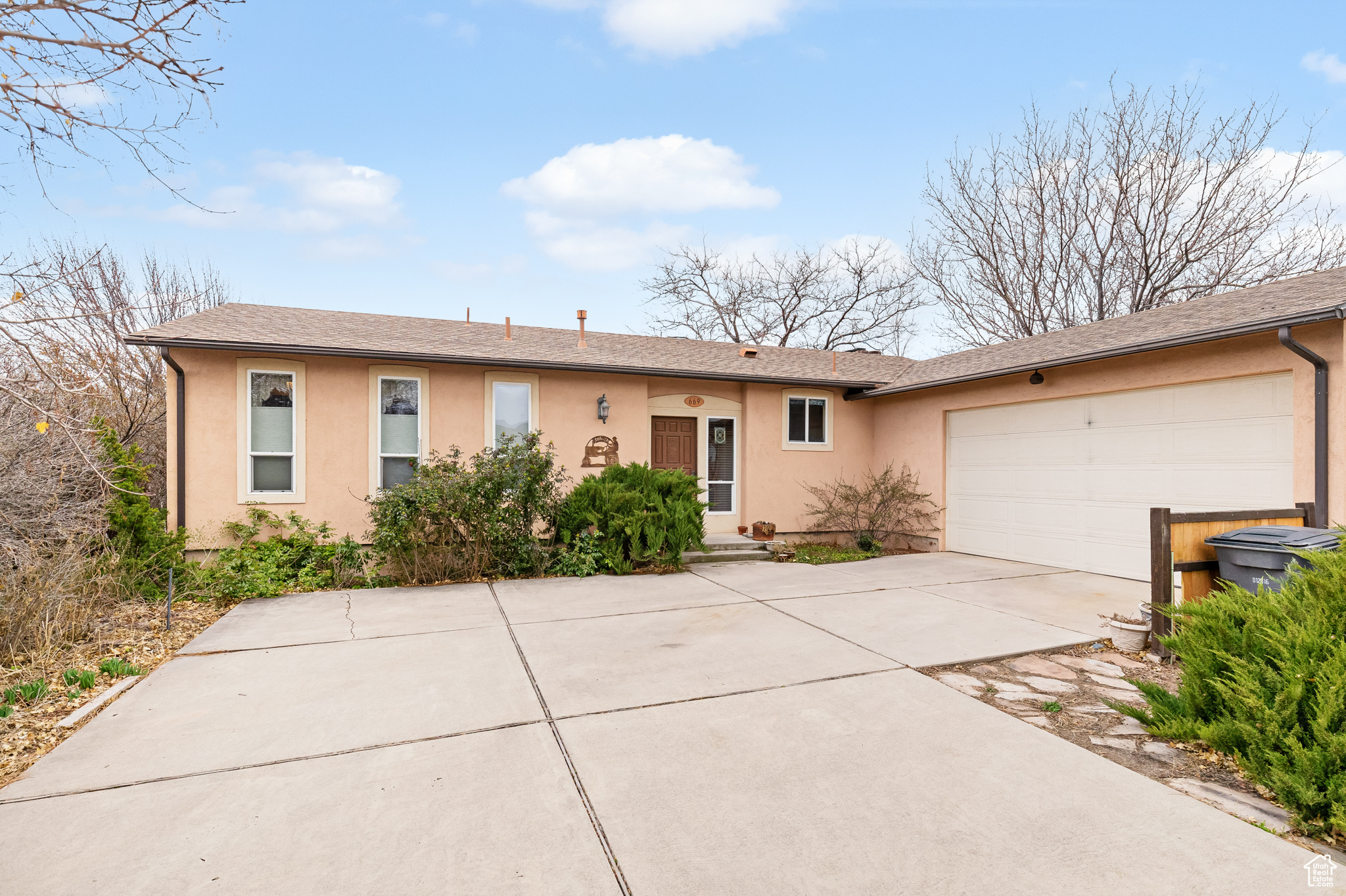 Ranch-style house with a garage