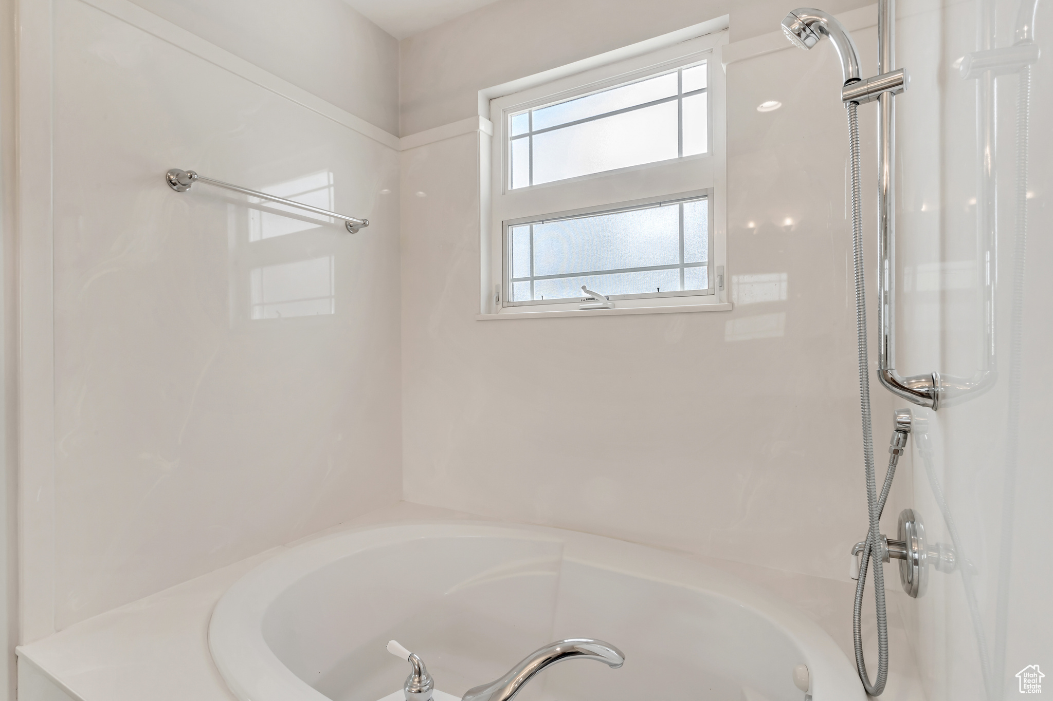 Large soaking tub and shower in primary suite on second floor