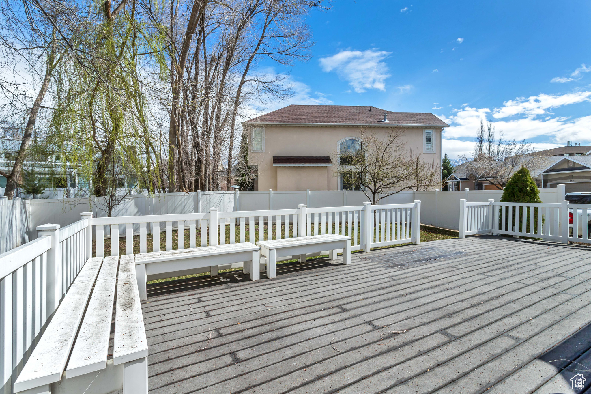 Oversized deck with state-of-the-art composite material for beauty durability, and sustainability. Plenty of bench seating for entertaining, and fenced backyard for privacy