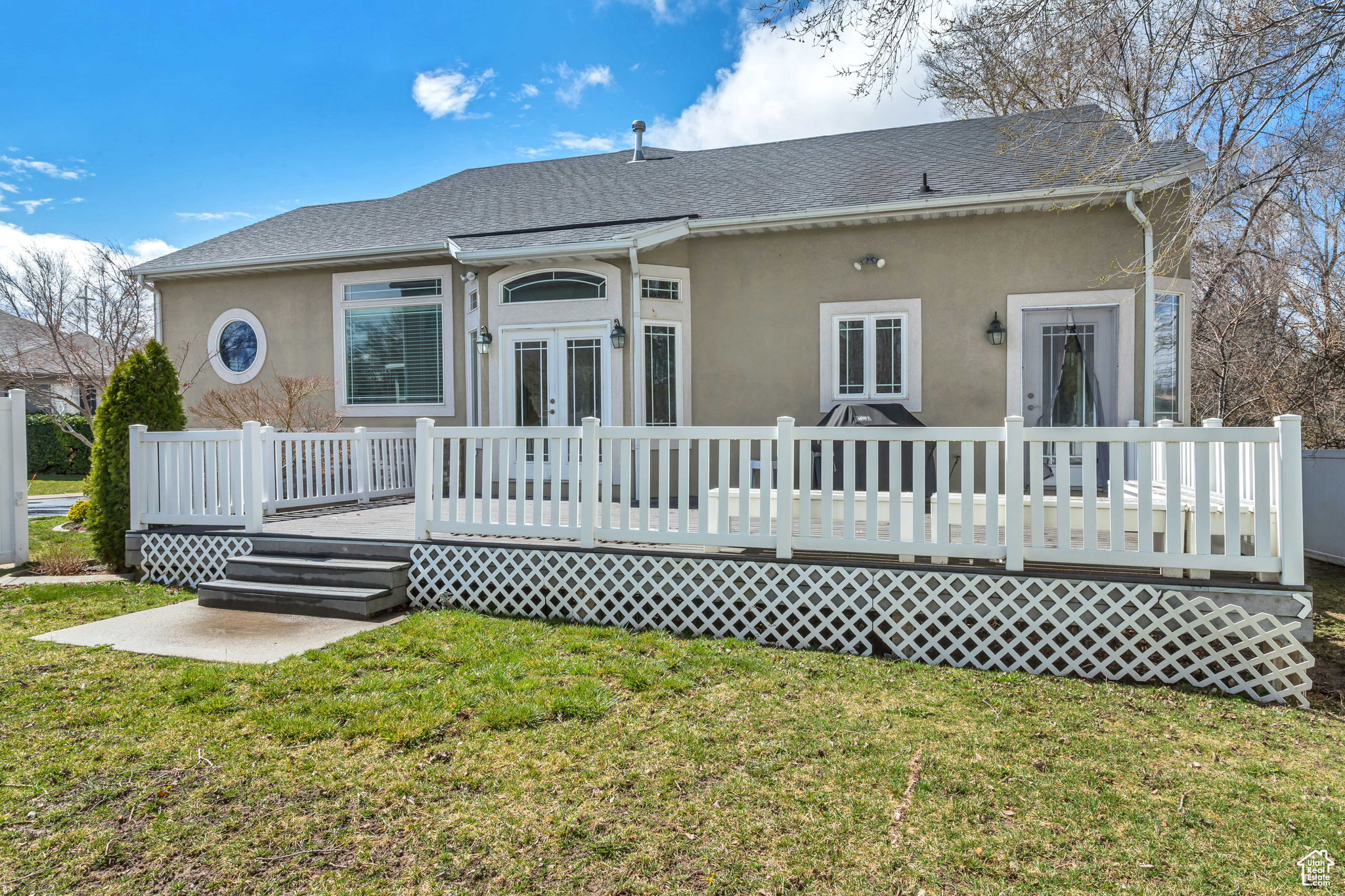 Large backyard on 1.5 lots sets this home apart from all the others in the community.  Oversized deck perfect for entertaining or relaxing. Gas line ran to deck for new Weber grill, which is included with the home.