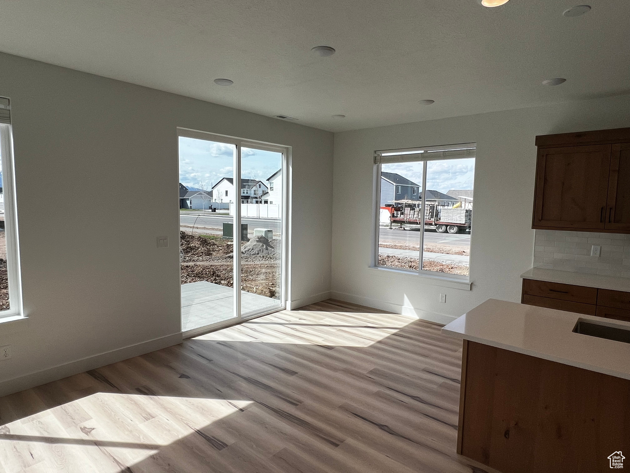 Unfurnished dining area with light hardwood / wood-style floors