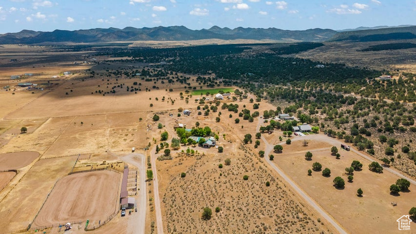 Birds eye view of property featuring a mountain view