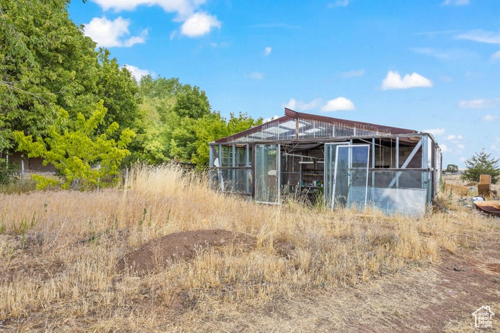 Exterior space featuring an outdoor structure