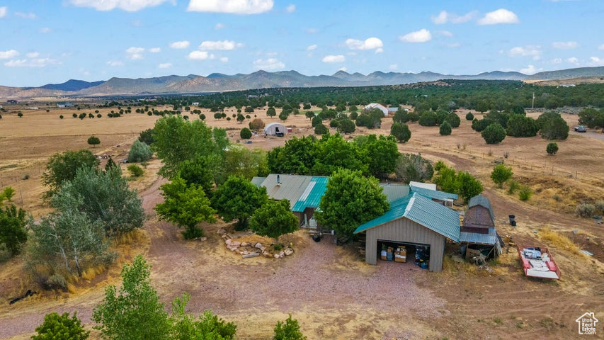 Drone / aerial view featuring a mountain view and a rural view