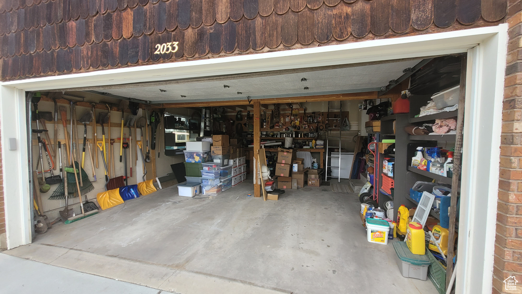 View of garage with work bench