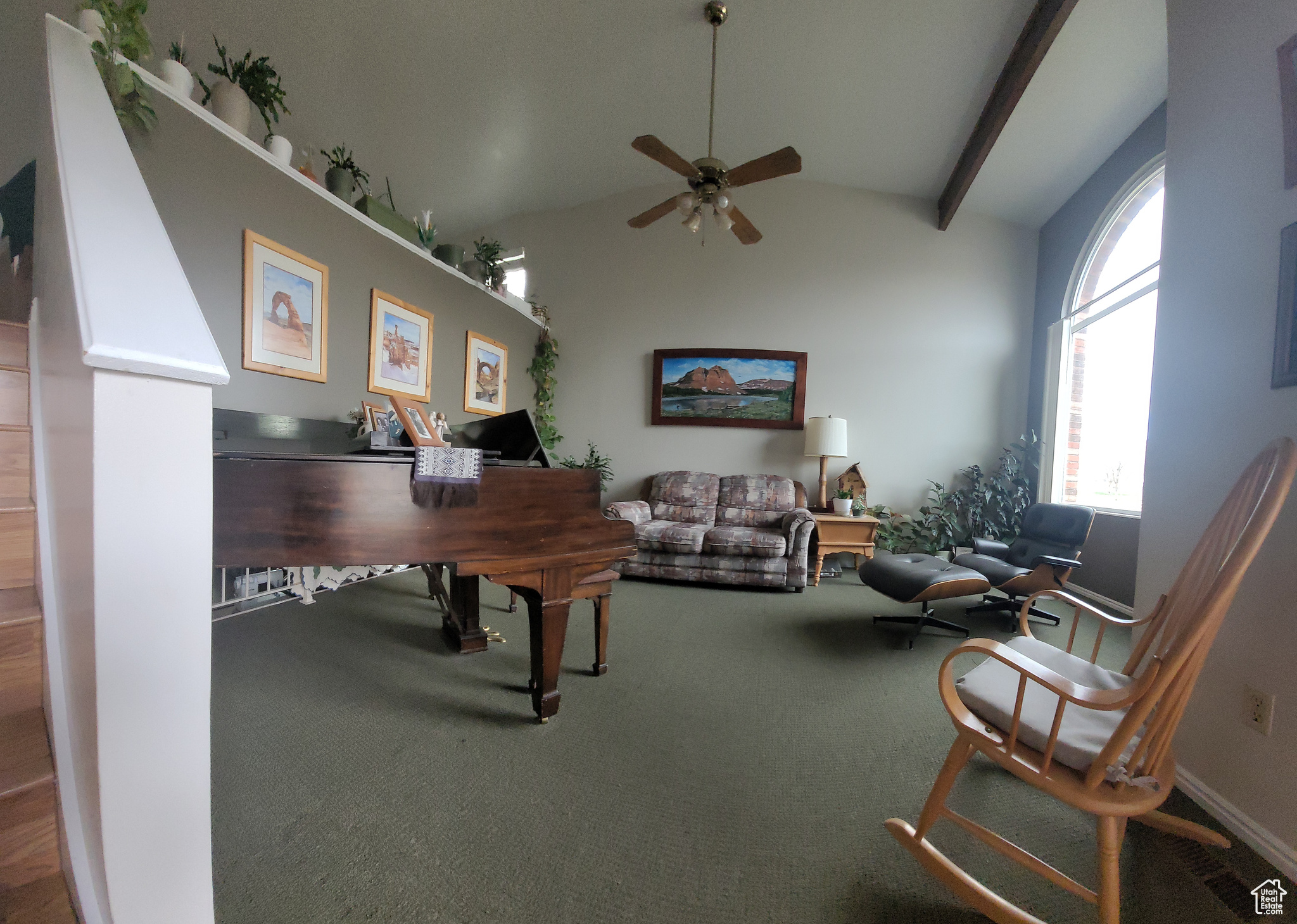 Office area with vaulted ceiling with beams, ceiling fan, and carpet floors